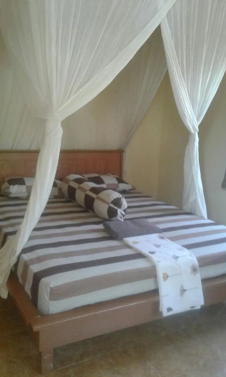 Bed in Arnel Bungalows