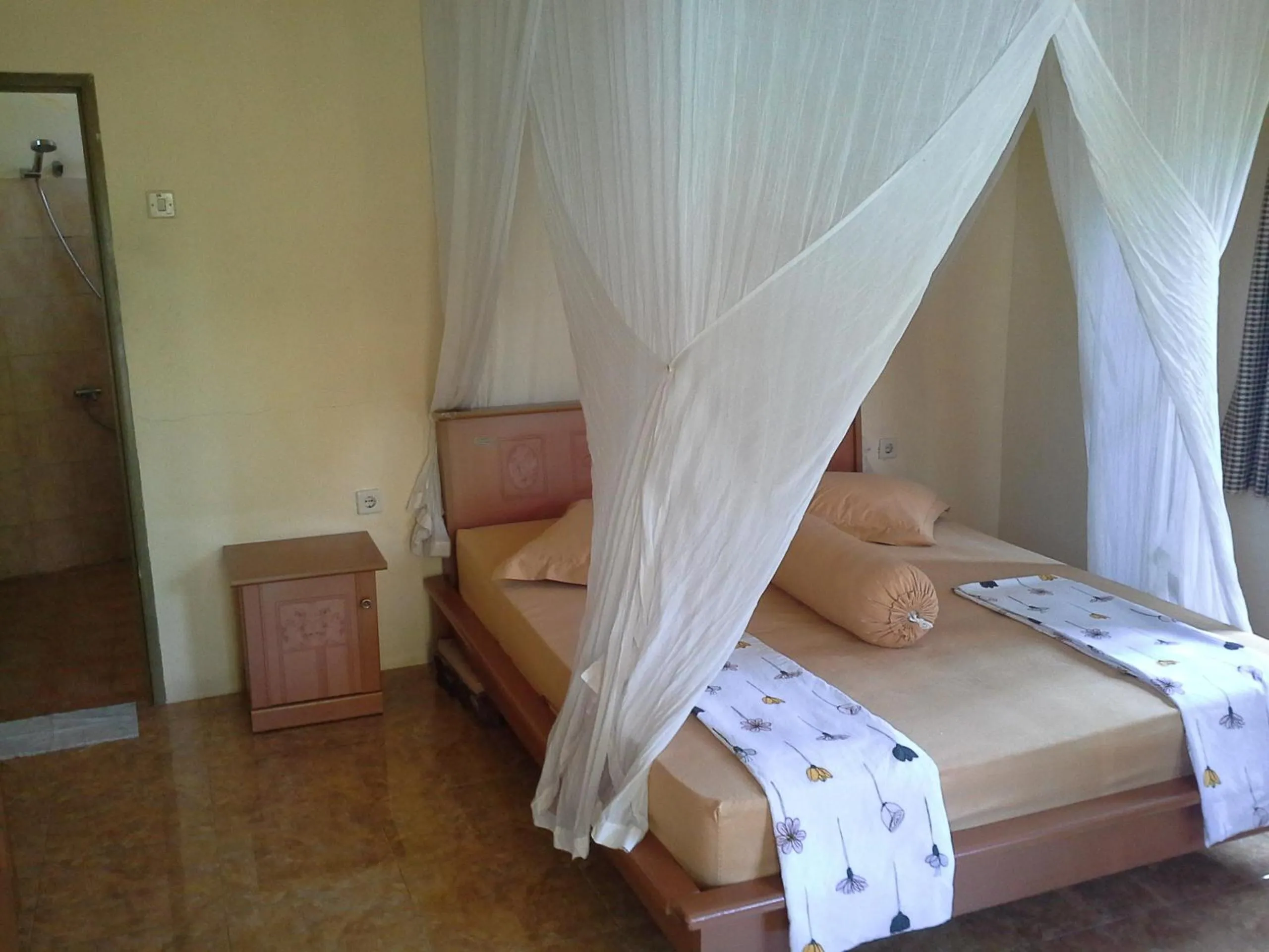 Bed in Arnel Bungalows