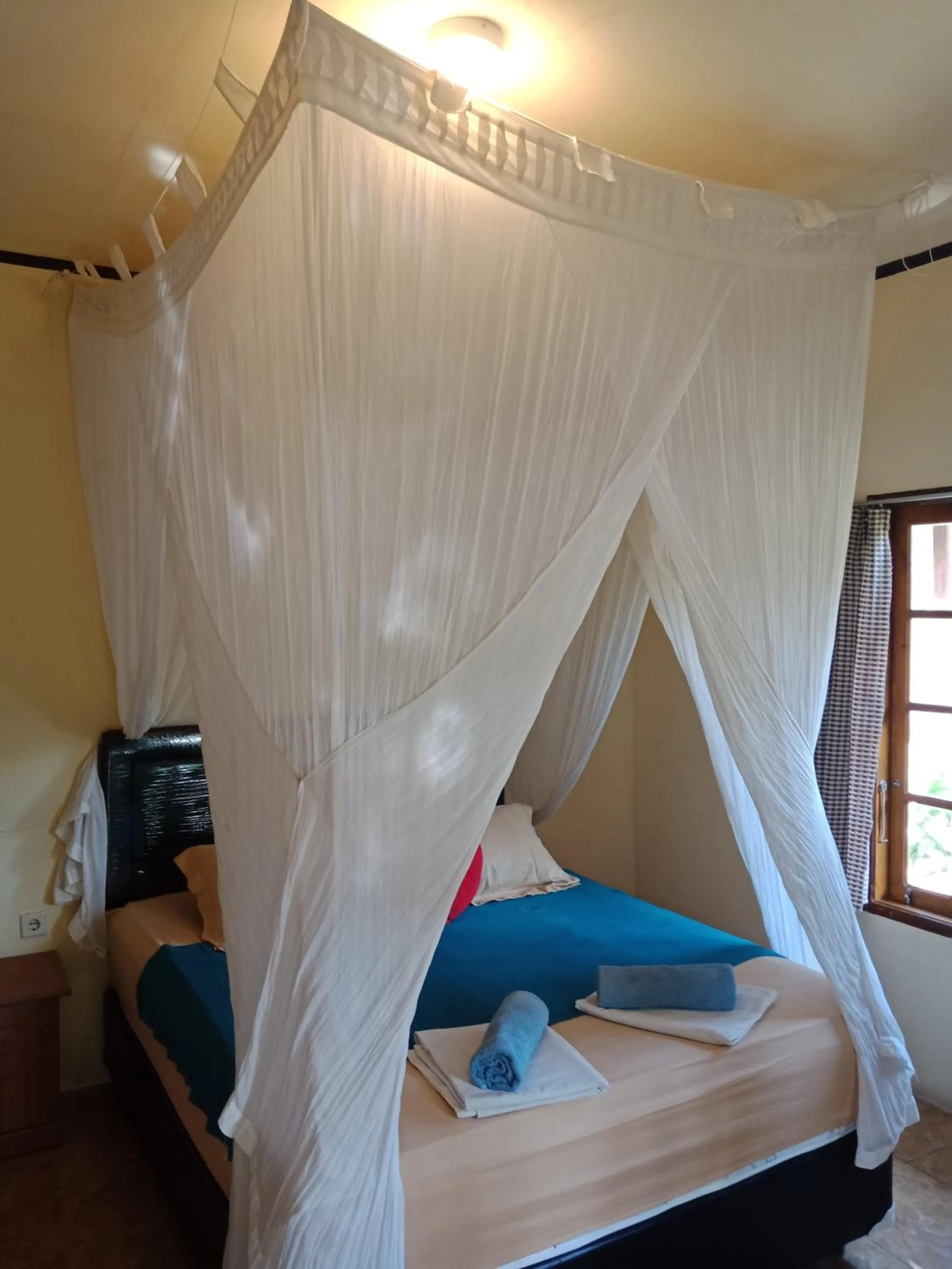 Bed in Arnel Bungalows