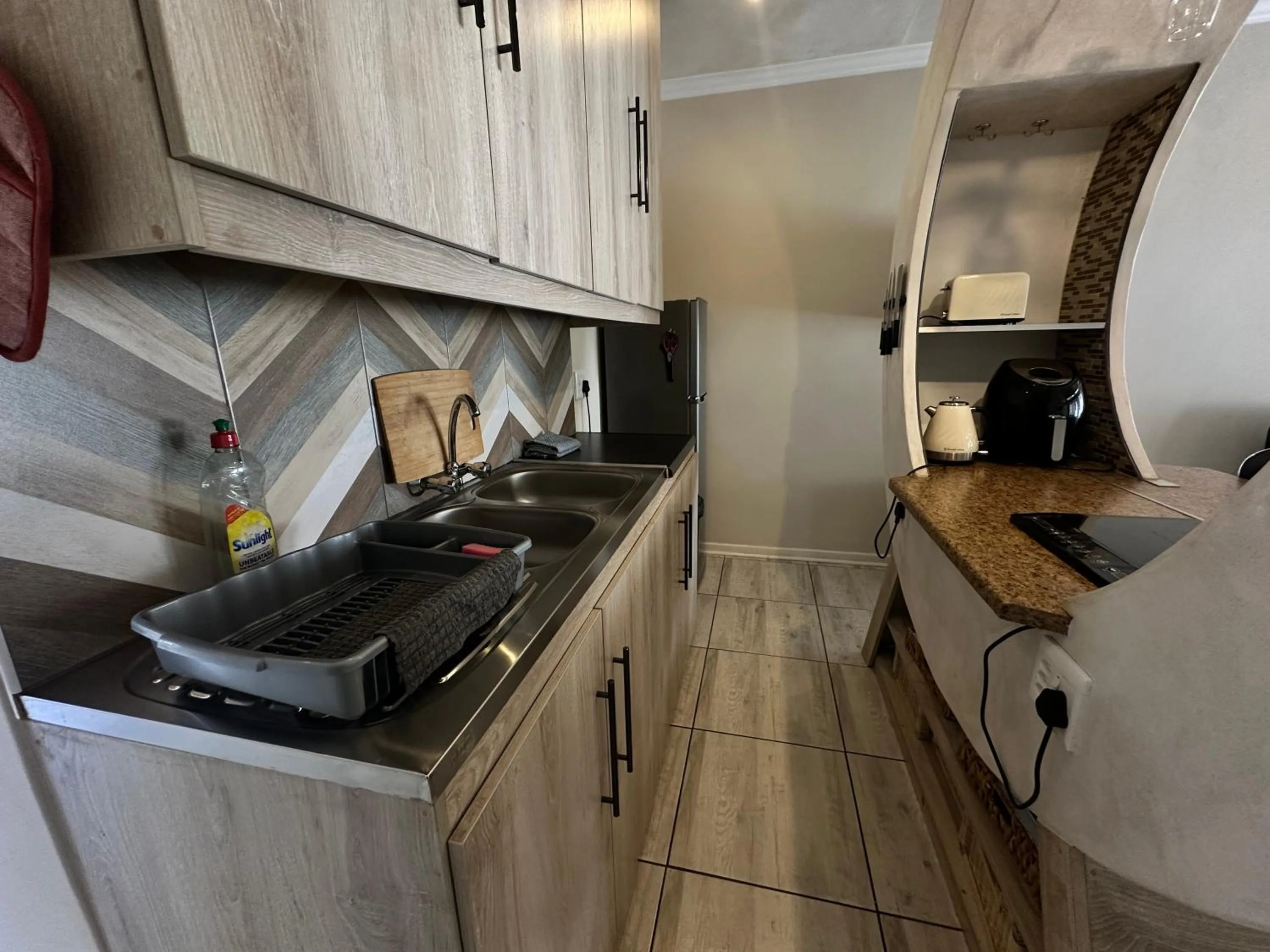 Kitchen or kitchenette in Kiwara Guesthouse