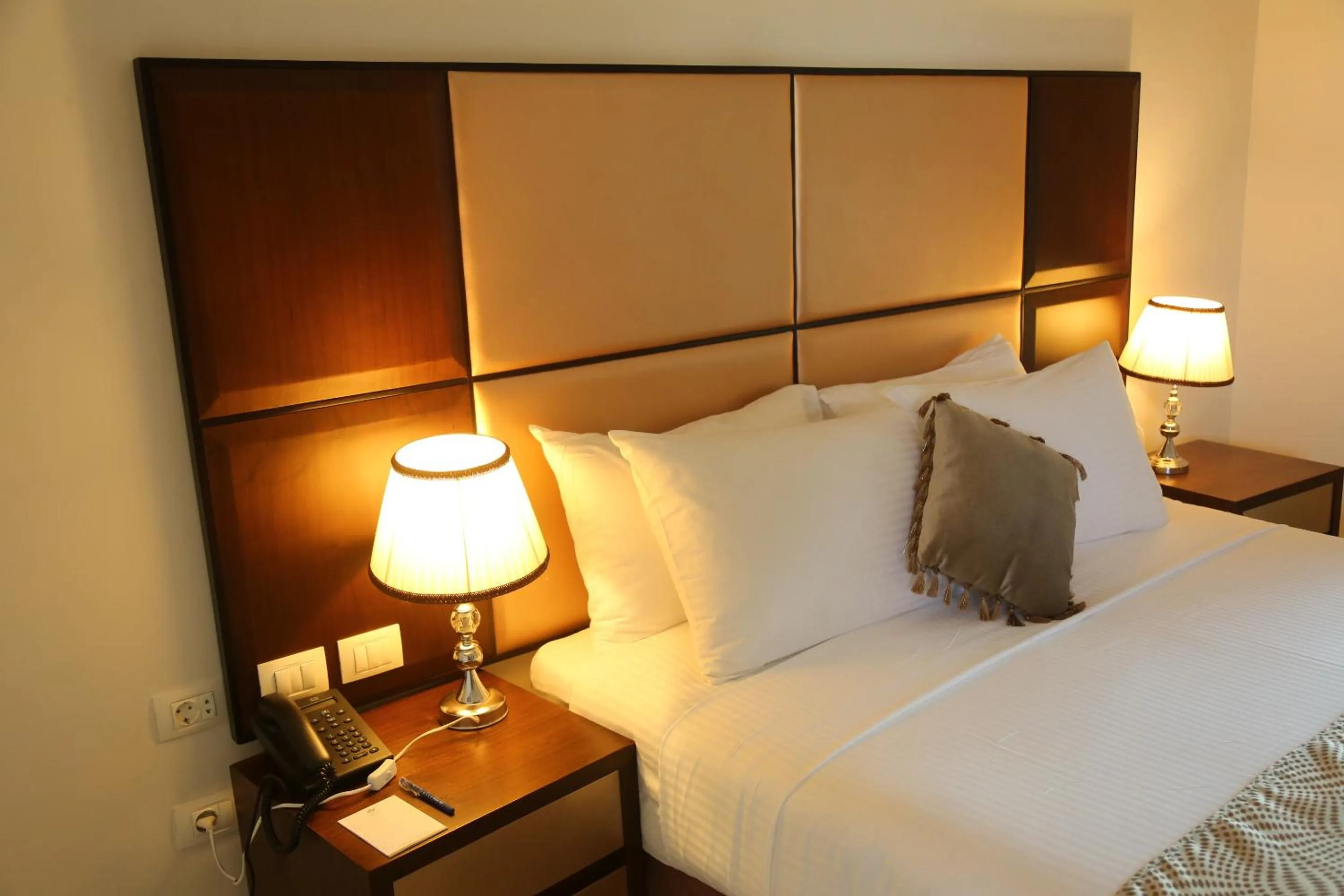 Pool view, Bed in Tolip Golden Plaza