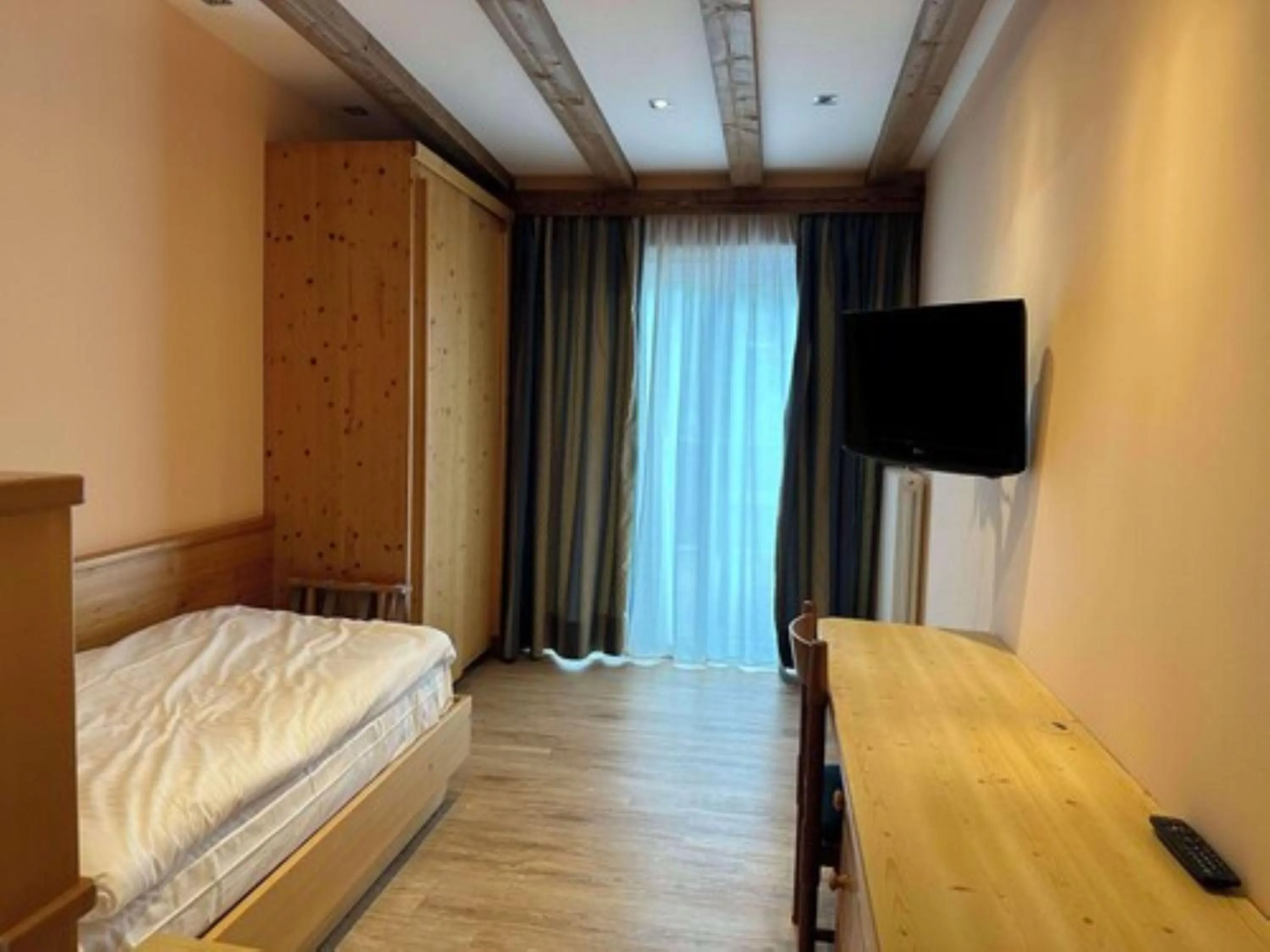 Bedroom, Bed in Hotel Cima Rosetta - BW Signature Collection