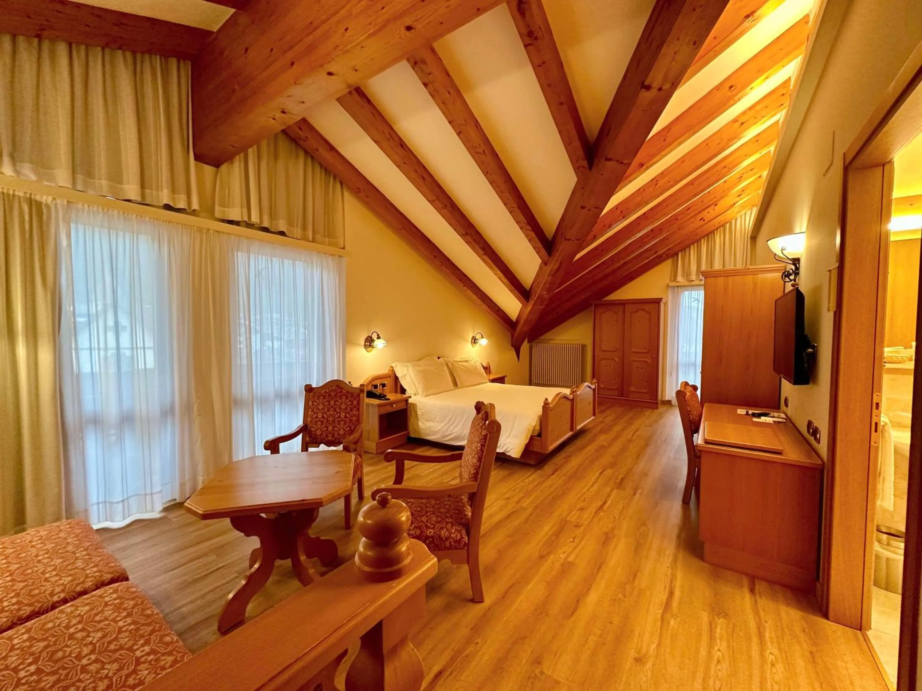 Photo of the whole room, Bed in Hotel Cima Rosetta - BW Signature Collection