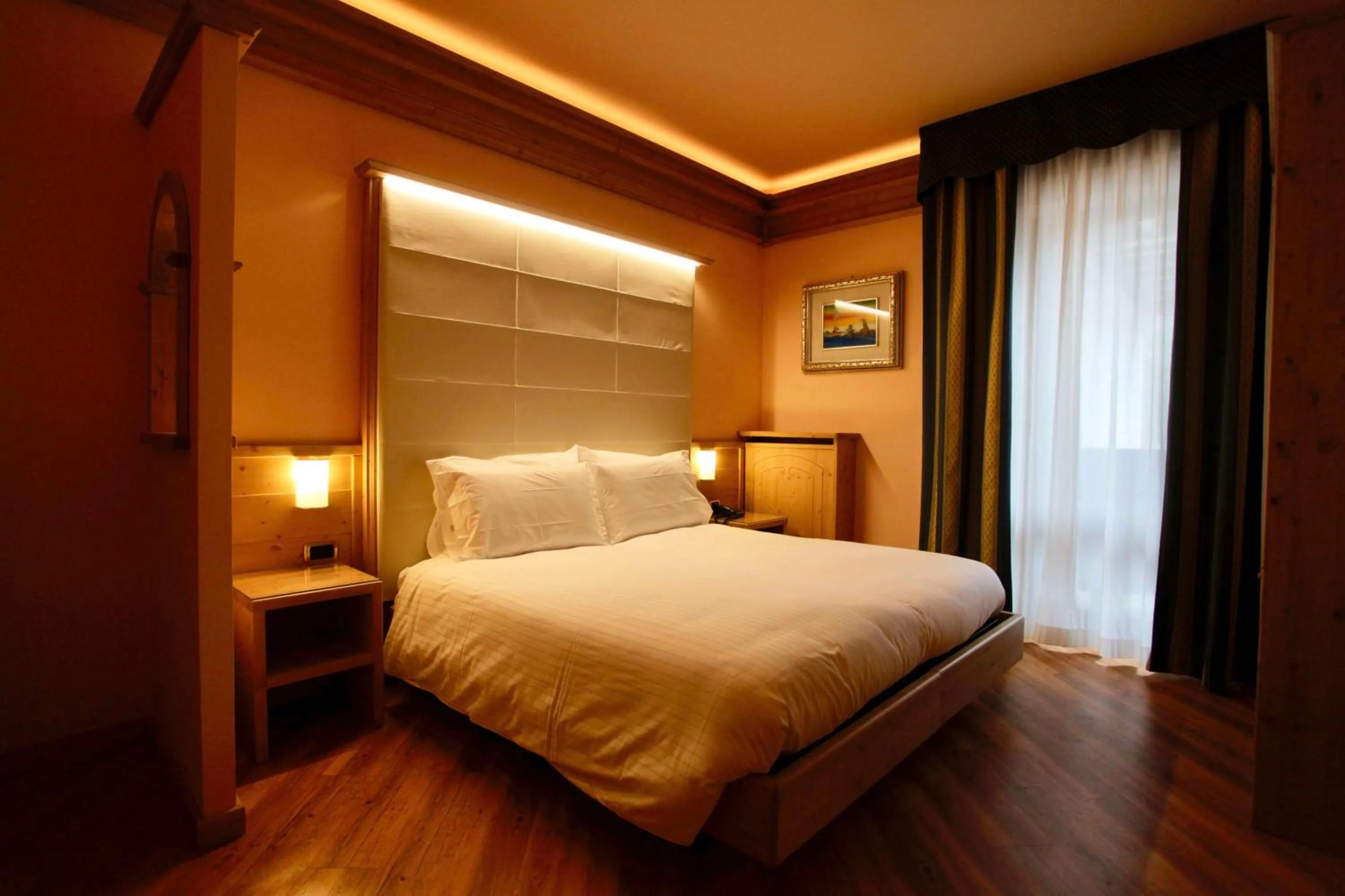 Bedroom, Bed in Hotel Cima Rosetta - BW Signature Collection