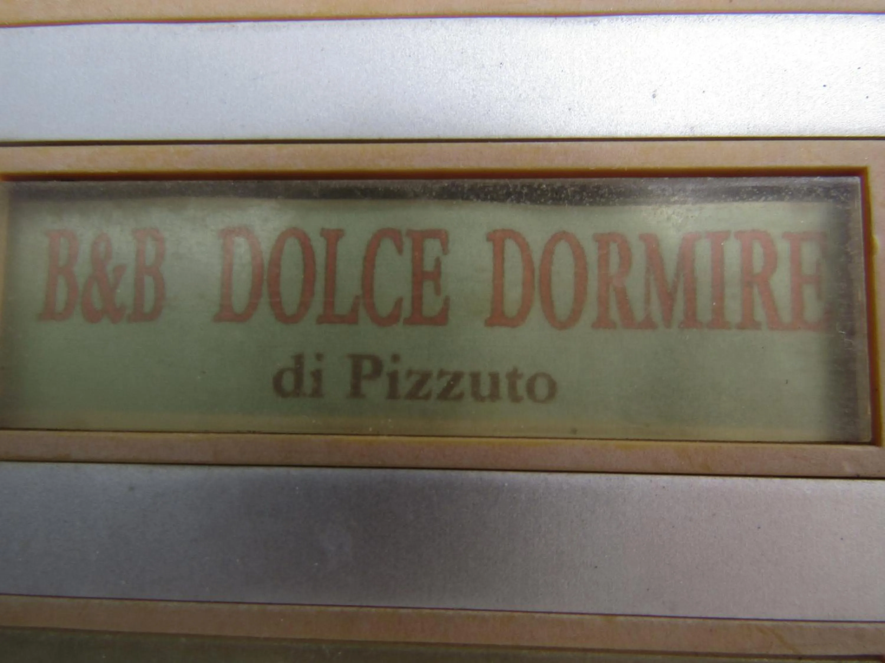 Property logo or sign in Dolce Dormire