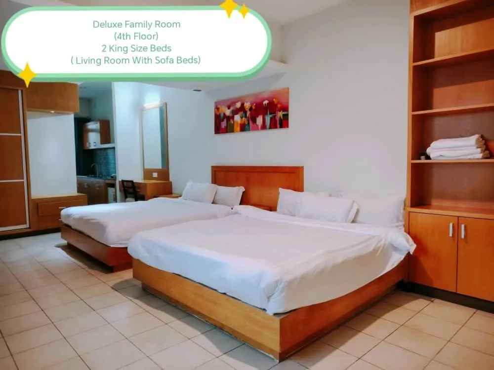 Bed in Fratini's Hotel Labuan