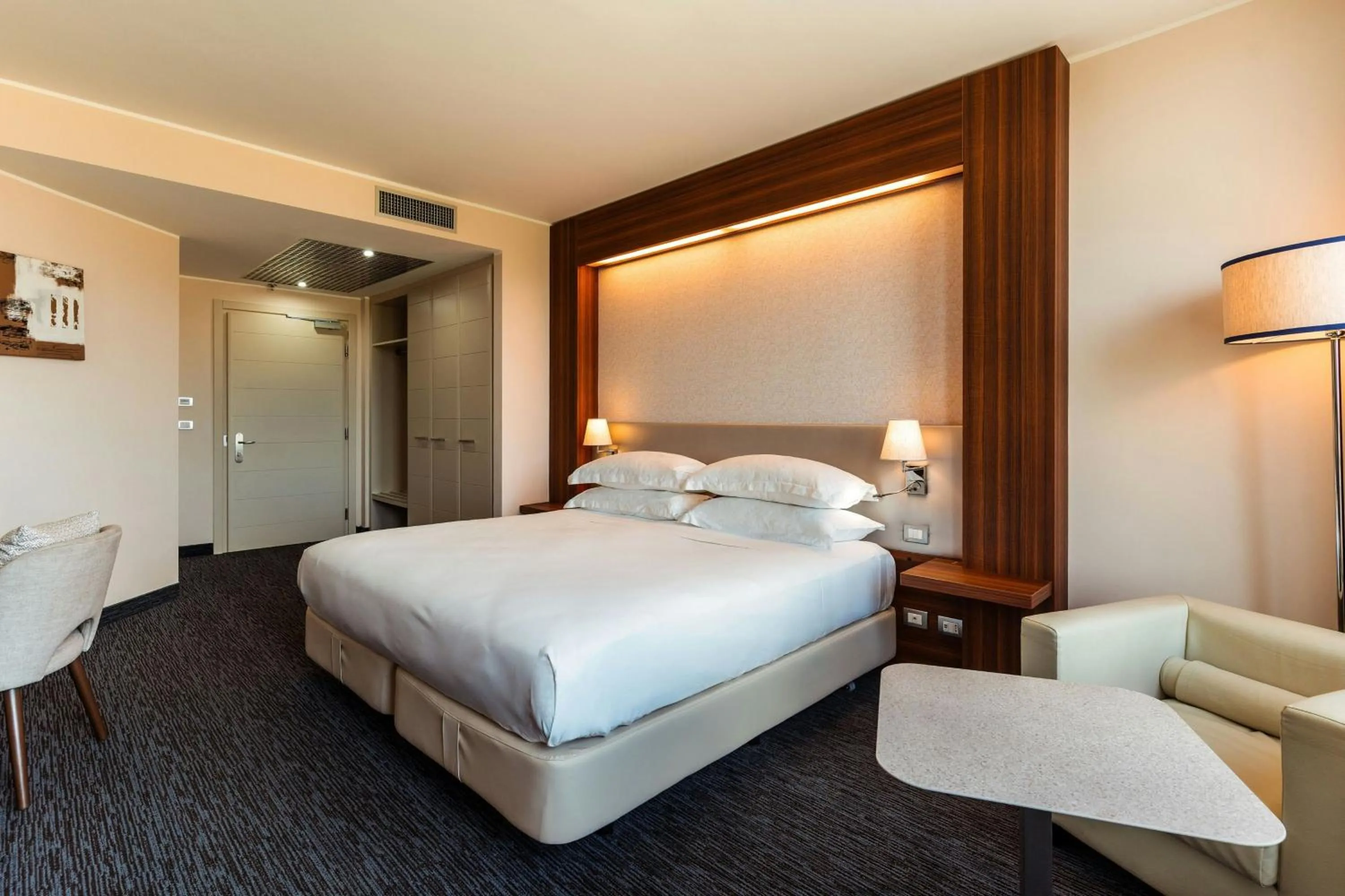 Photo of the whole room, Bed in Delta Hotels by Marriott Olbia Sardinia