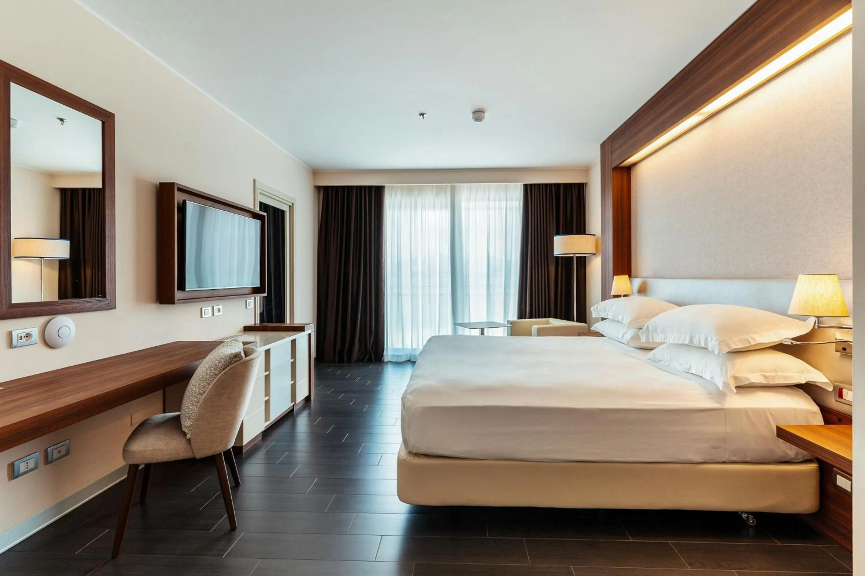 Photo of the whole room, Bed in Delta Hotels by Marriott Olbia Sardinia