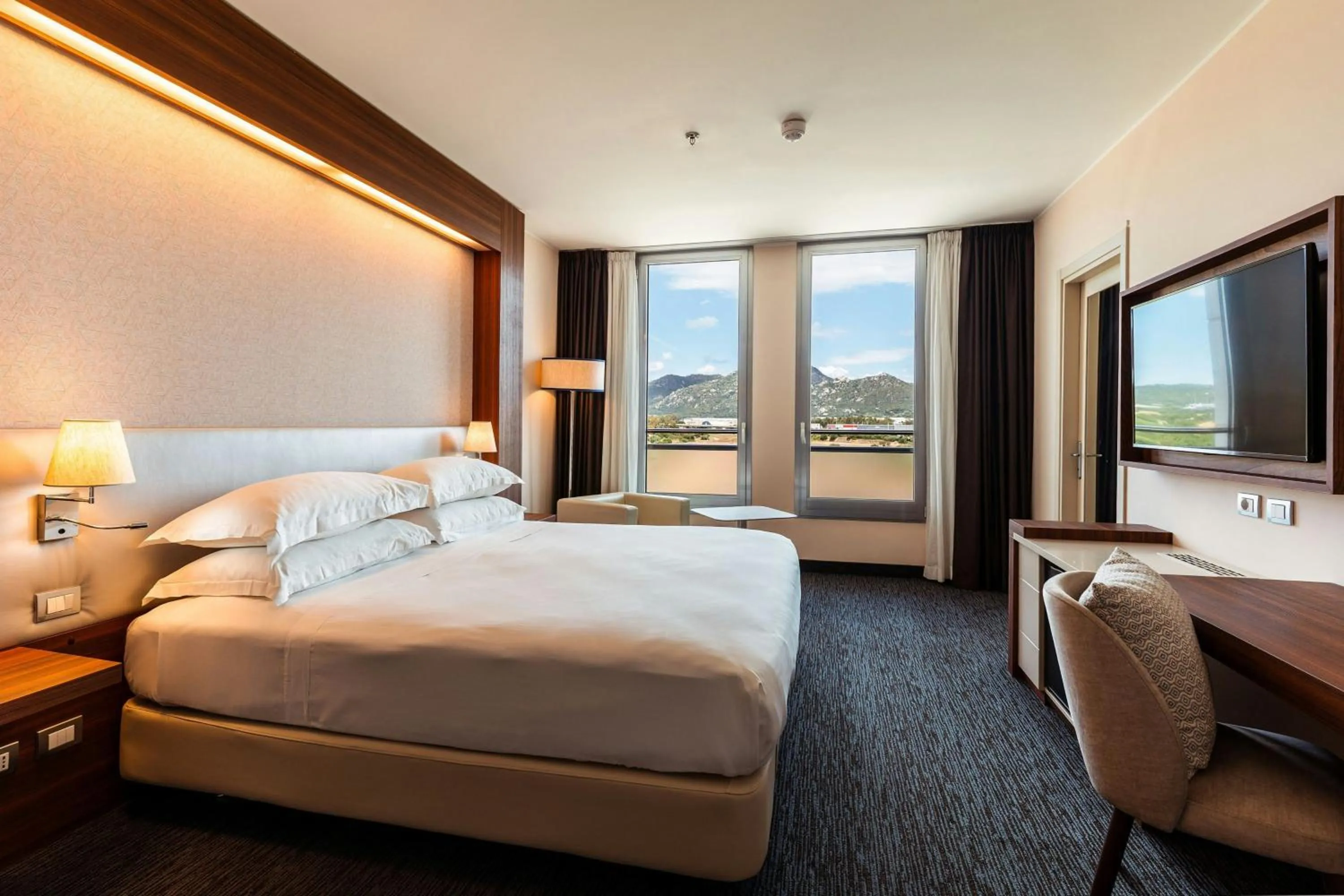 Photo of the whole room, Bed in Delta Hotels by Marriott Olbia Sardinia