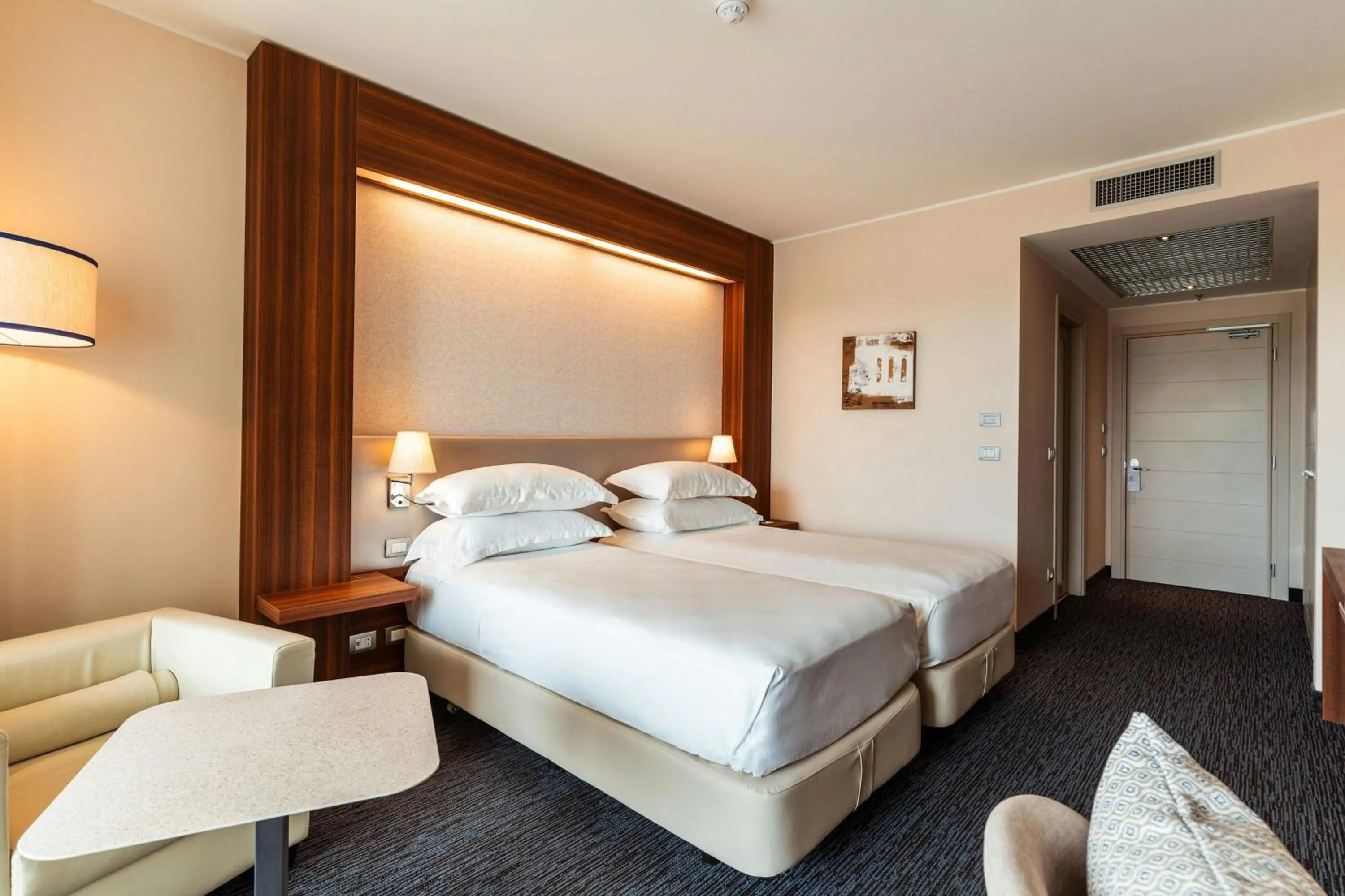 Photo of the whole room, Bed in Delta Hotels by Marriott Olbia Sardinia