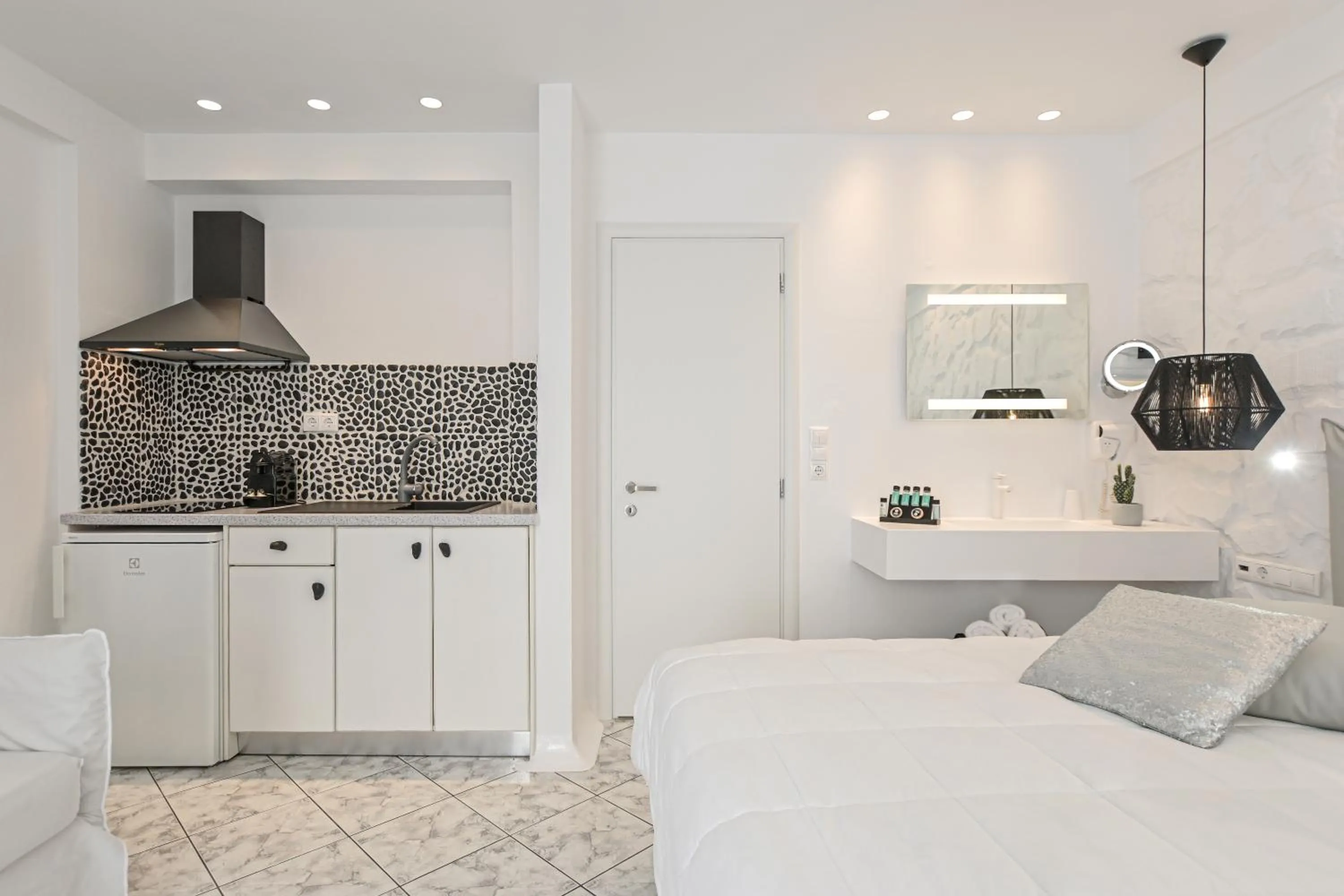 Bed in Naxos Evilion Luxury Apartments & Suites