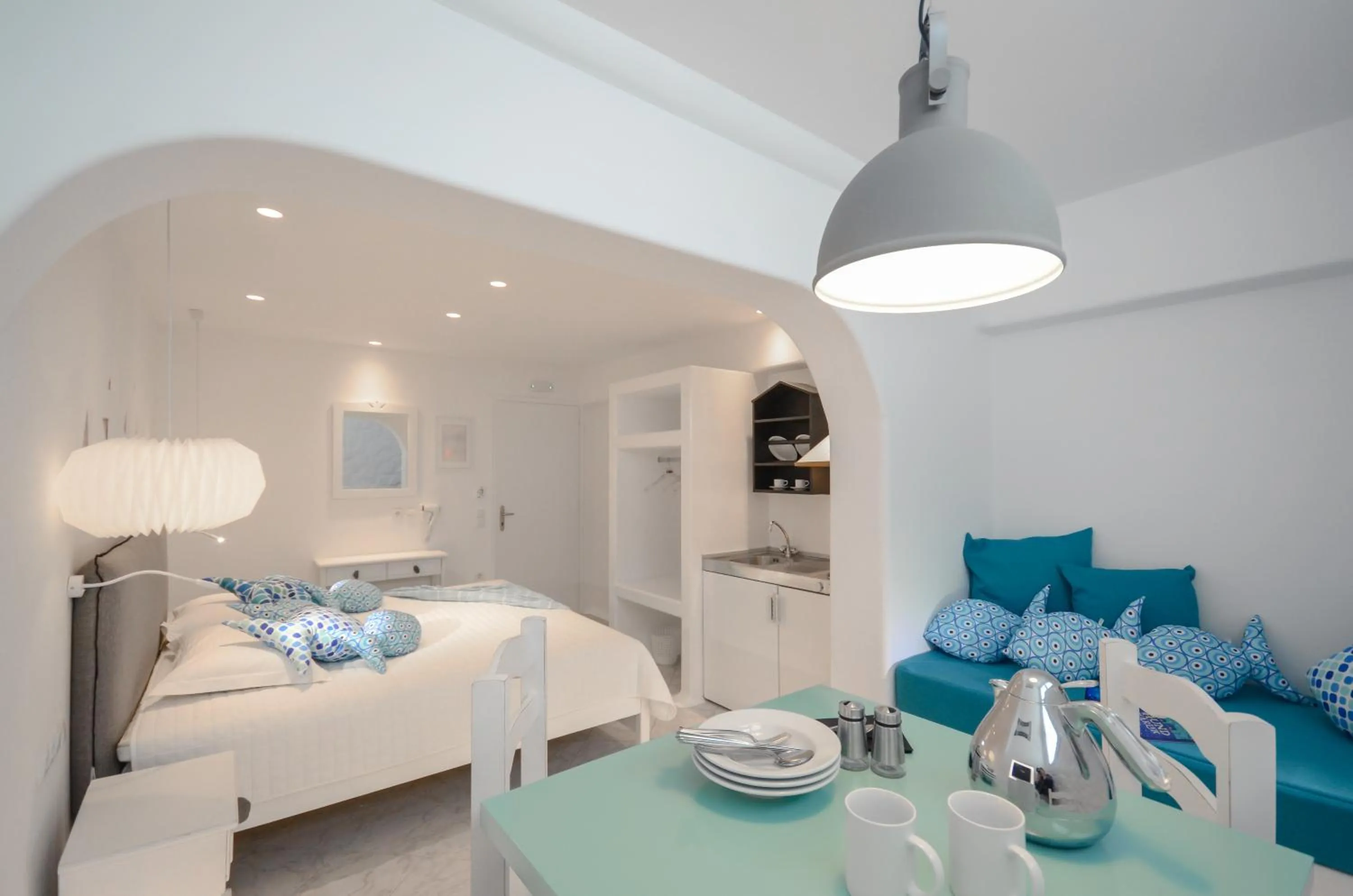 Photo of the whole room, Bed in Naxos Evilion Luxury Apartments & Suites