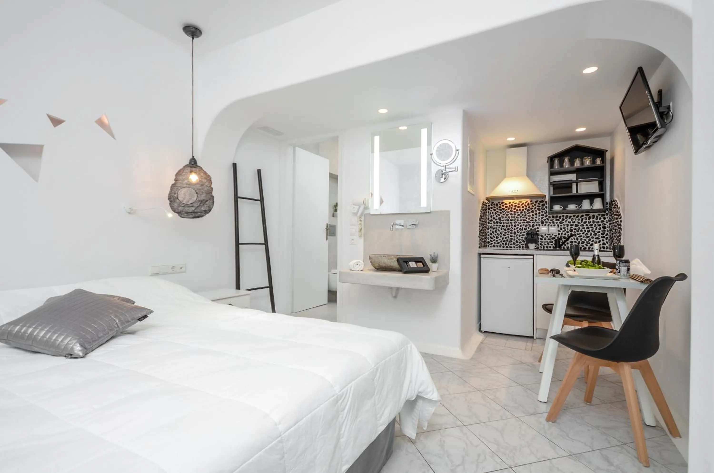 Bed in Naxos Evilion Luxury Apartments & Suites