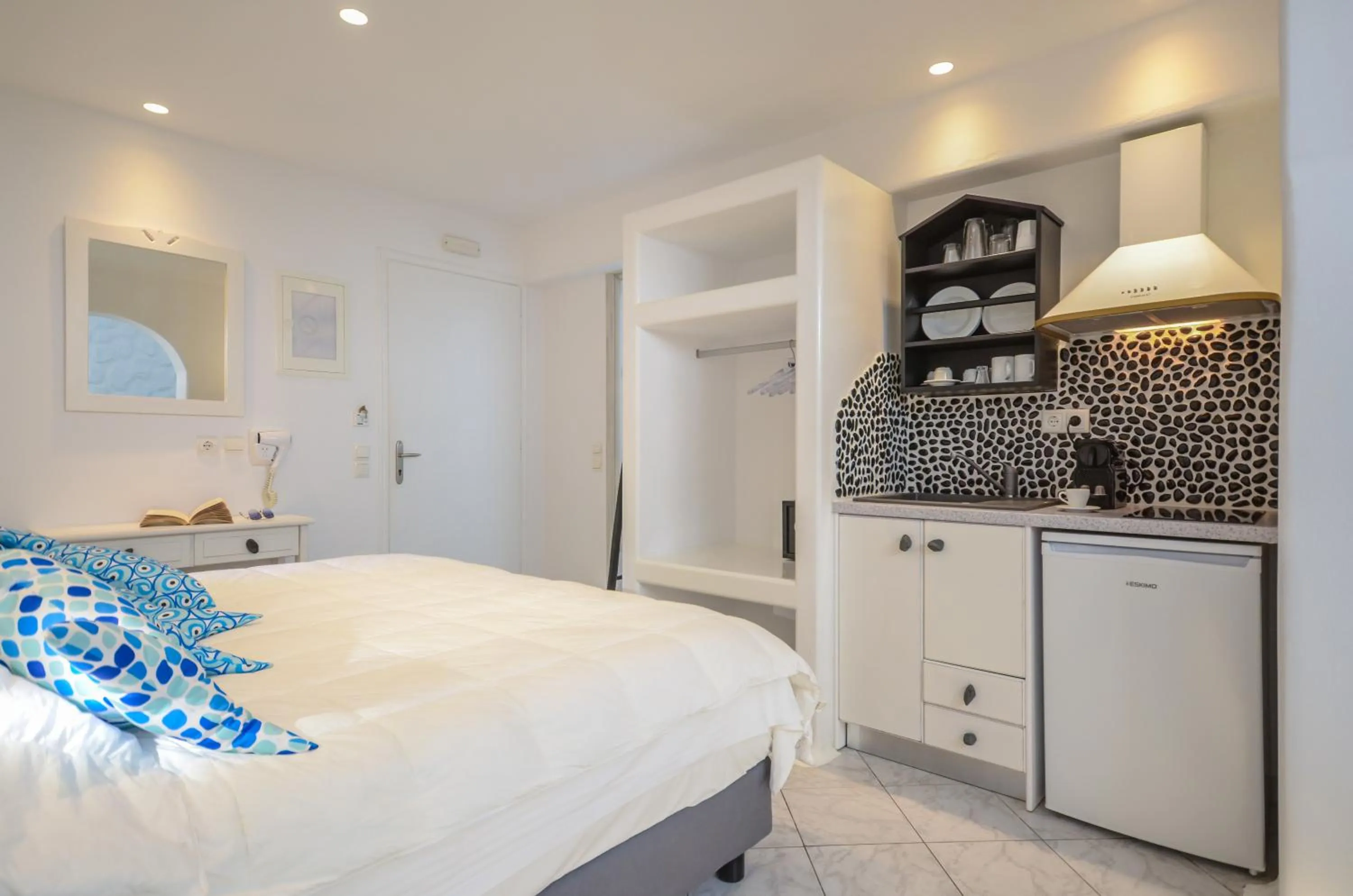 Bed in Naxos Evilion Luxury Apartments & Suites