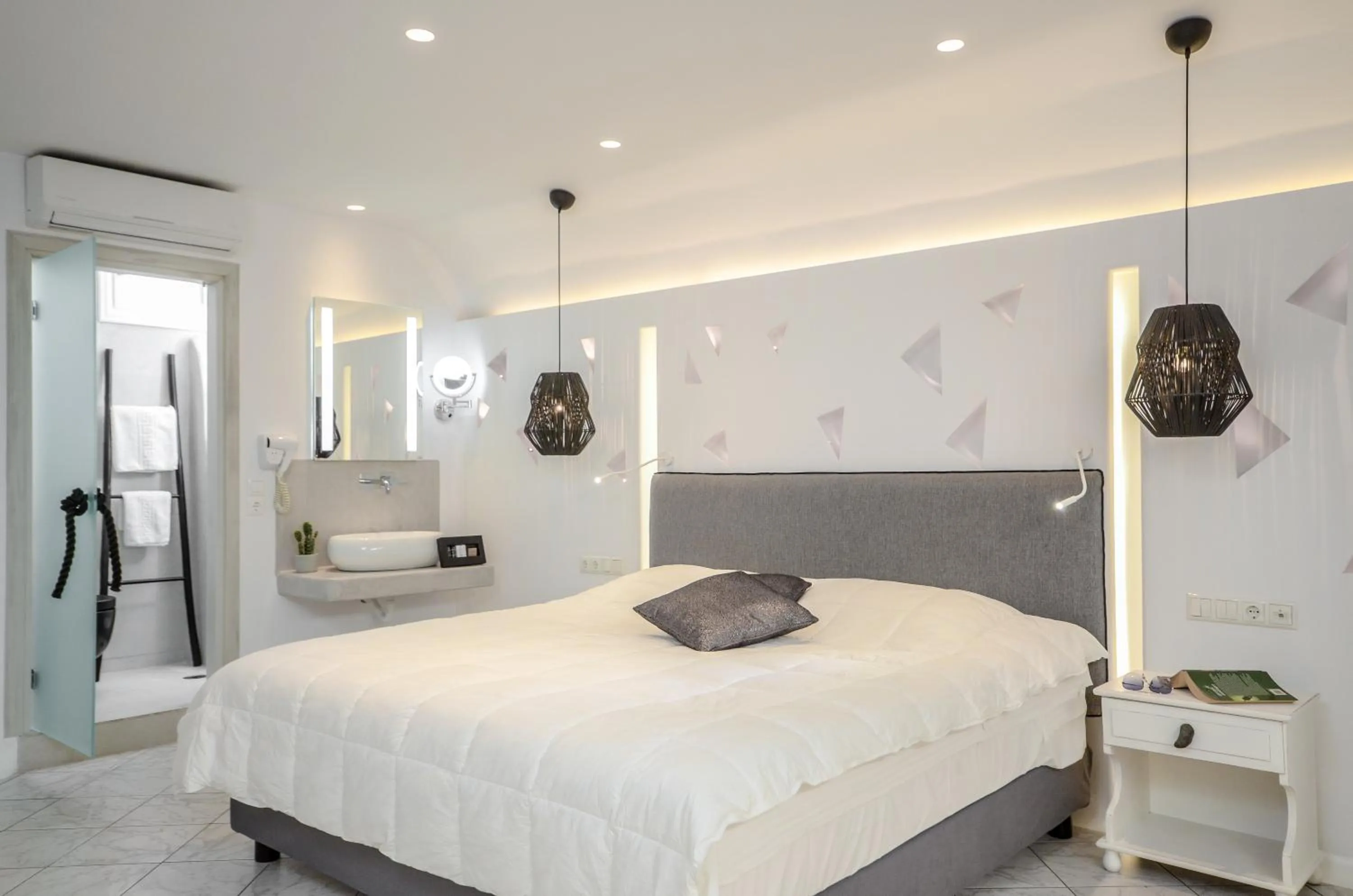 Bed in Naxos Evilion Luxury Apartments & Suites