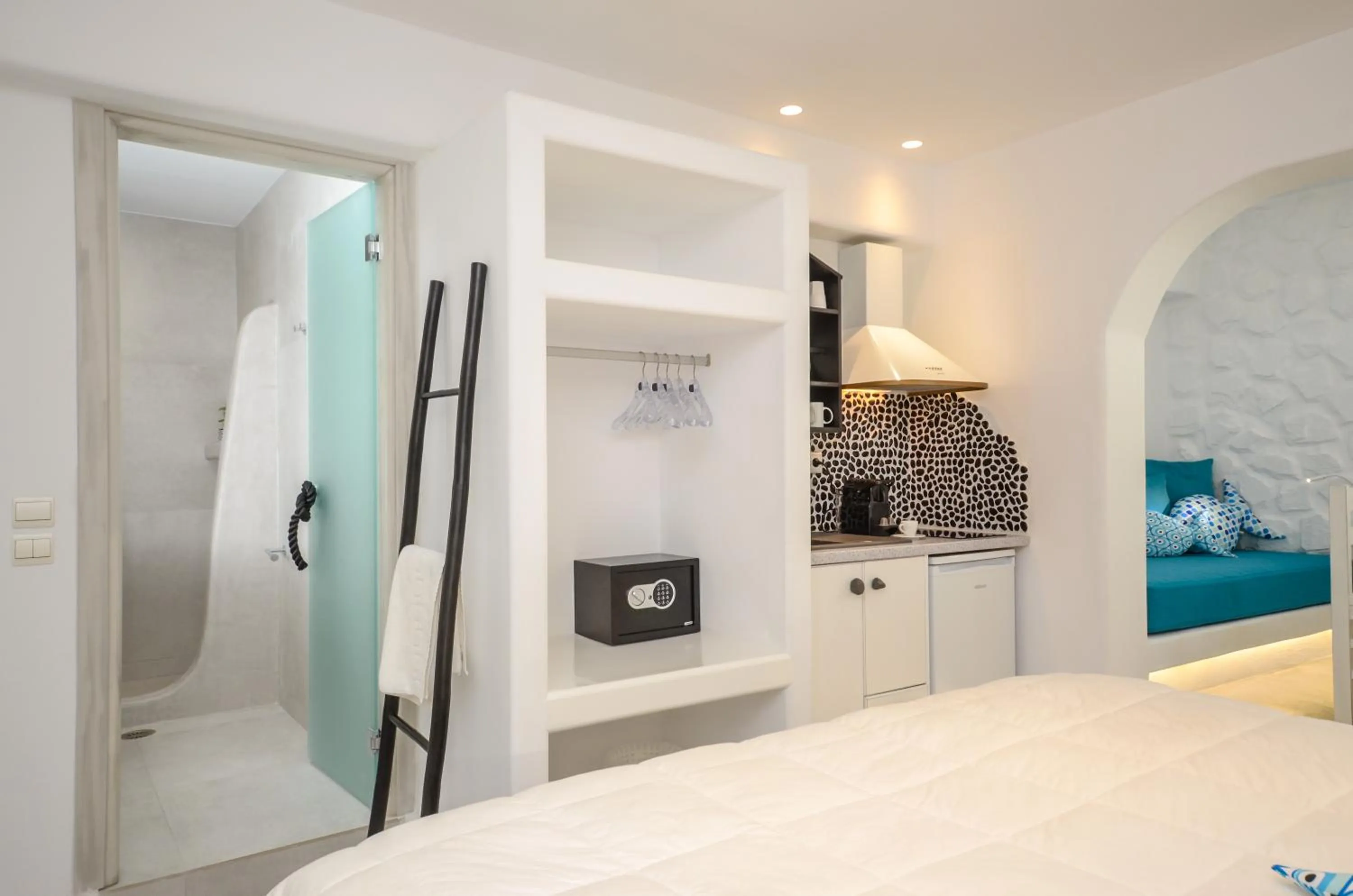 Bed in Naxos Evilion Luxury Apartments & Suites