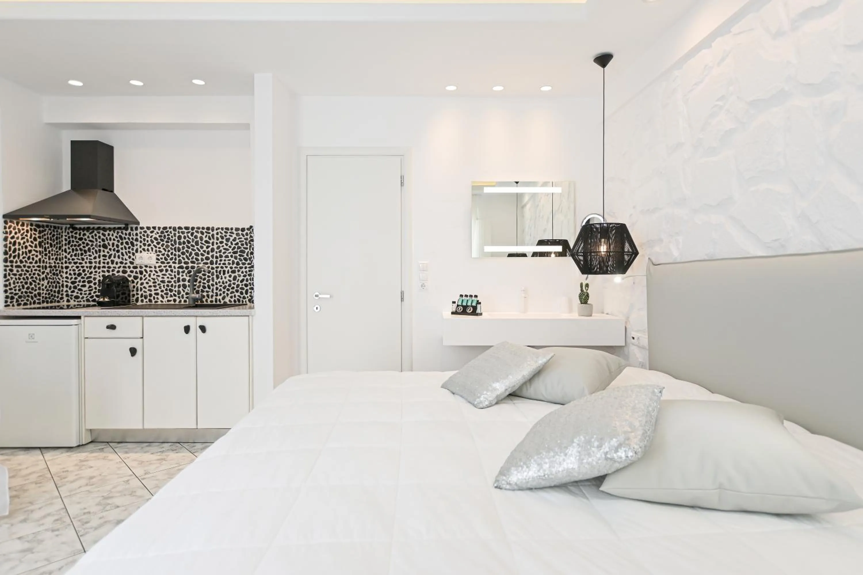 Bed in Naxos Evilion Luxury Apartments & Suites