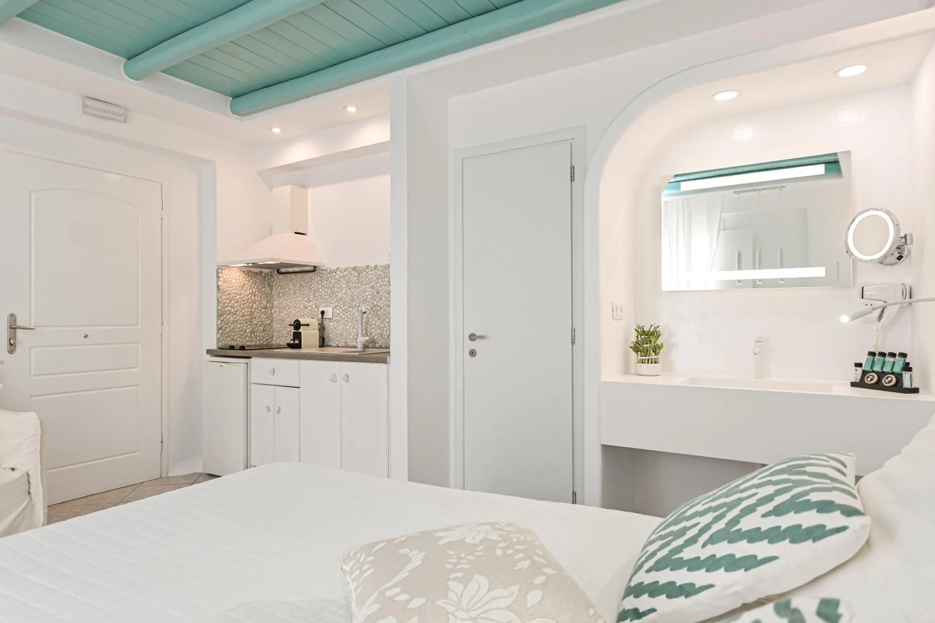 Bed in Naxos Evilion Luxury Apartments & Suites