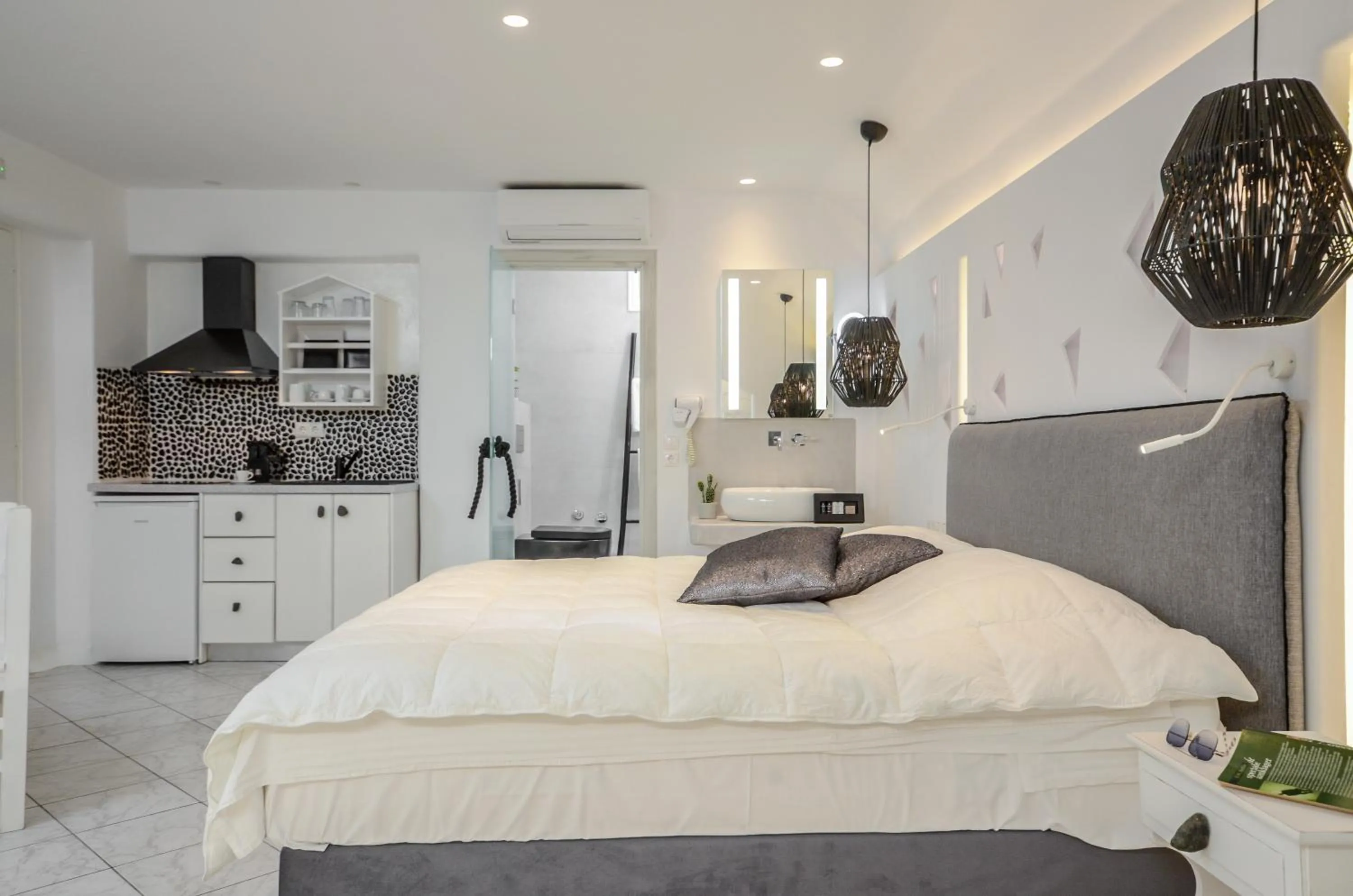 Bed in Naxos Evilion Luxury Apartments & Suites