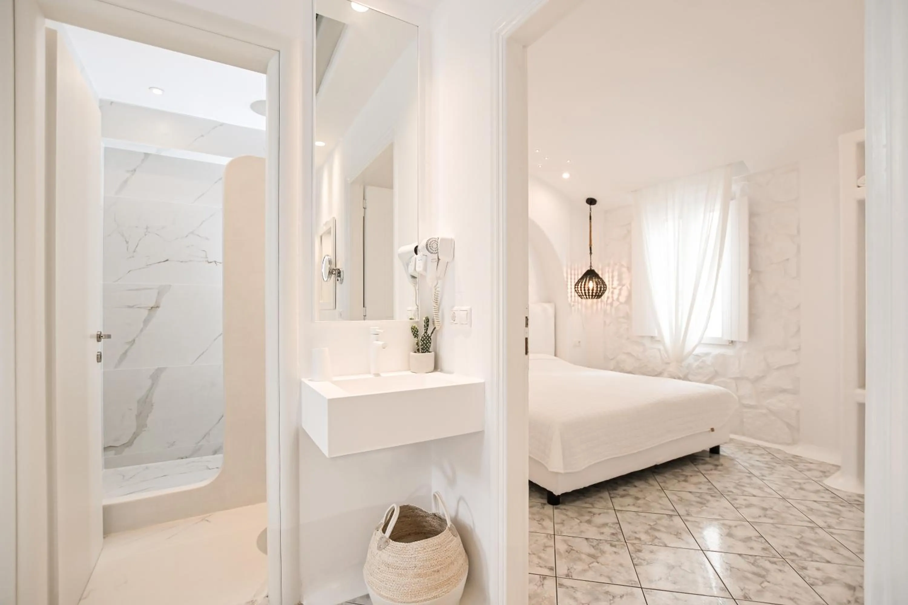 Bed in Naxos Evilion Luxury Apartments & Suites
