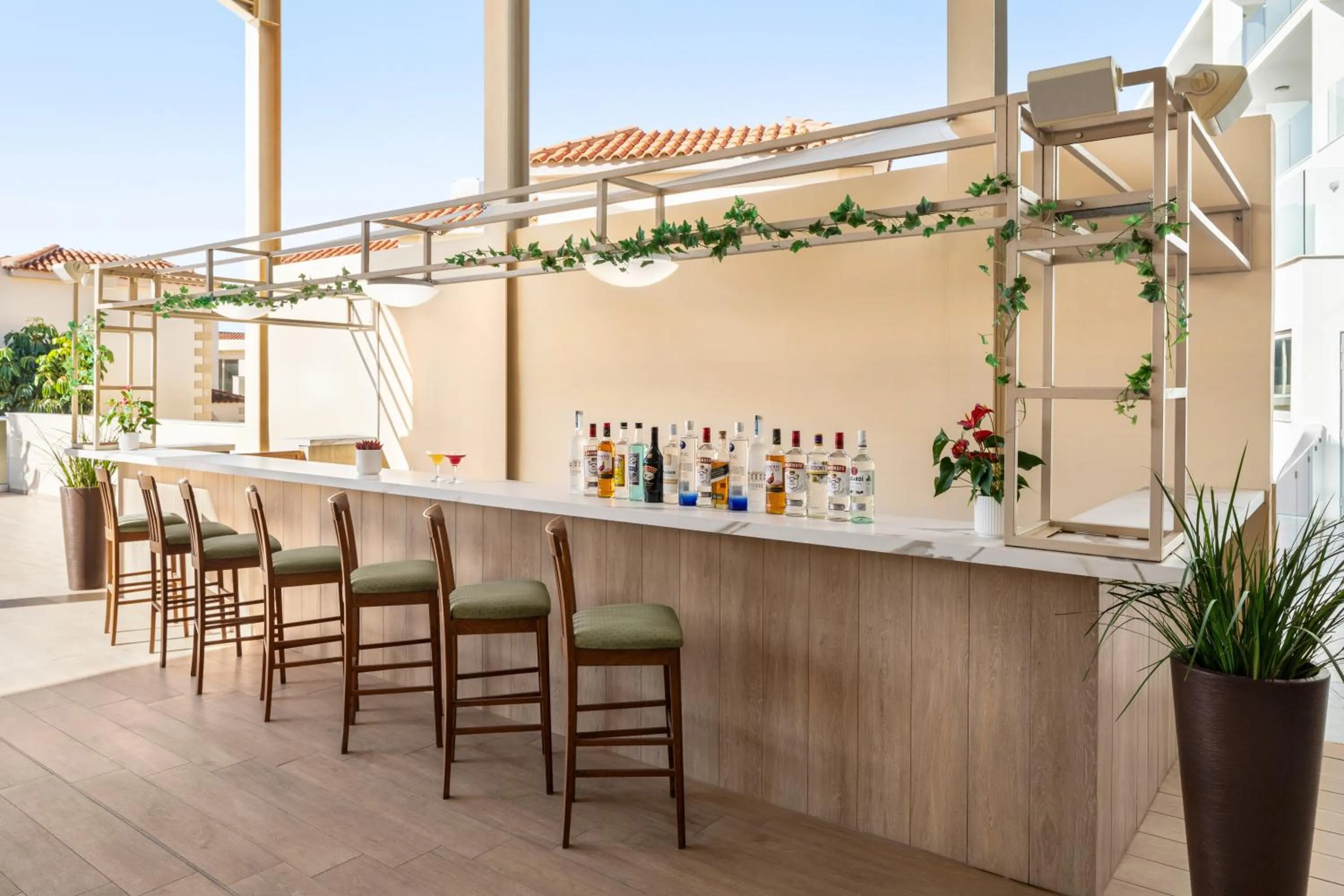 Lounge or bar in Ramada Hotel & Suites by Wyndham Ayia Napa