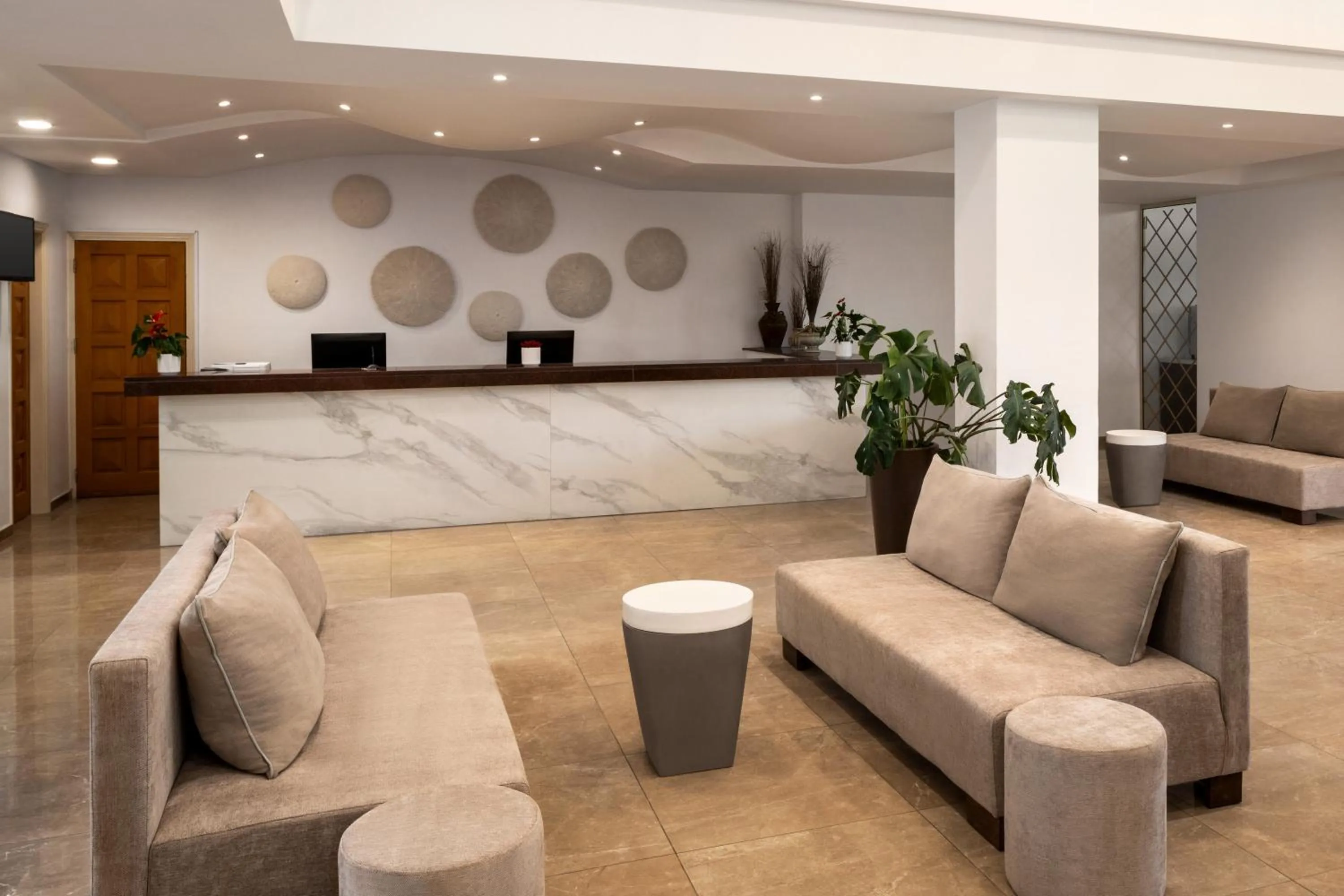 Lobby or reception in Ramada Hotel & Suites by Wyndham Ayia Napa