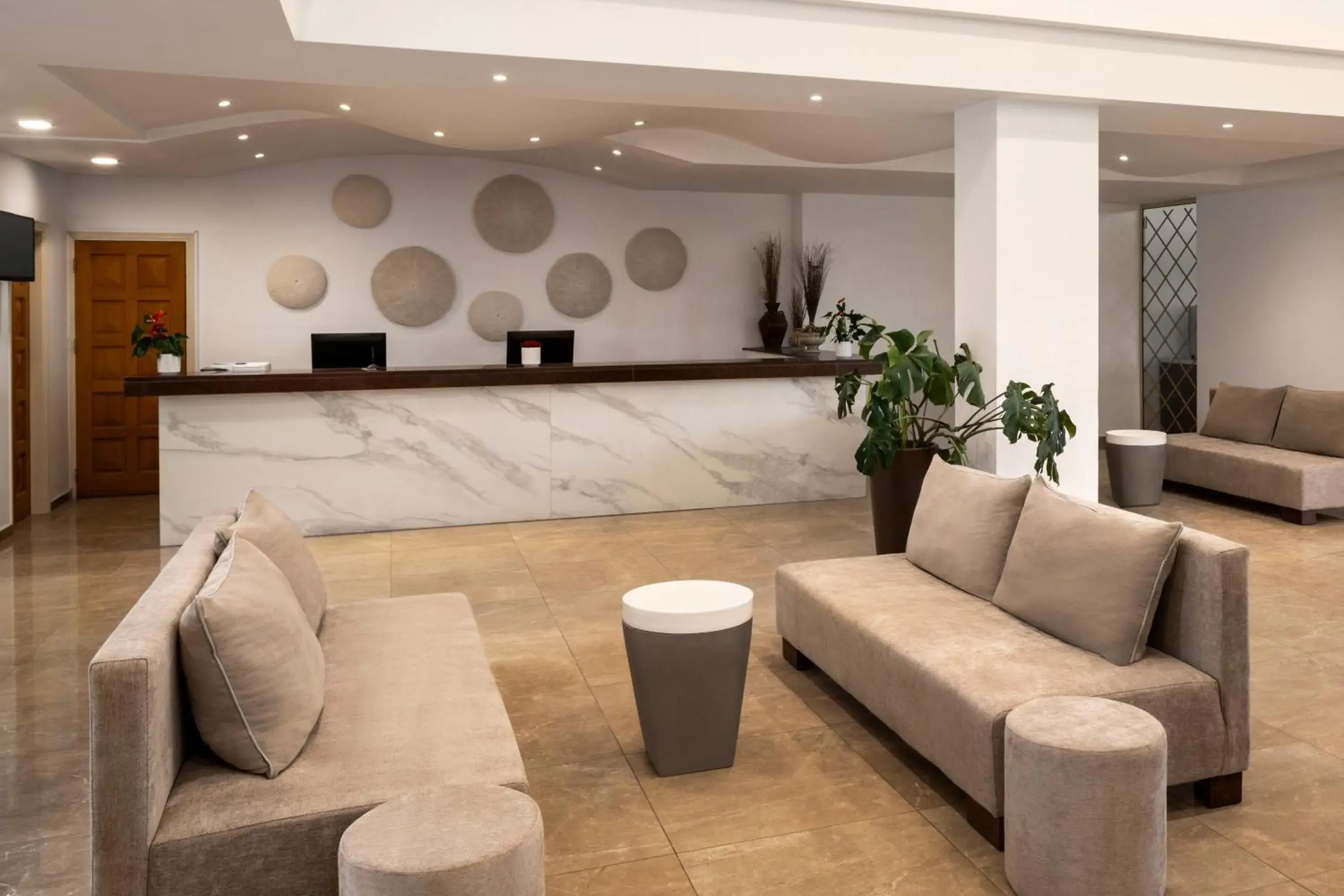 Lobby or reception in Ramada Hotel & Suites by Wyndham Ayia Napa Lobby or reception in Ramada Hotel & Suites by Wyndham Ayia Napa