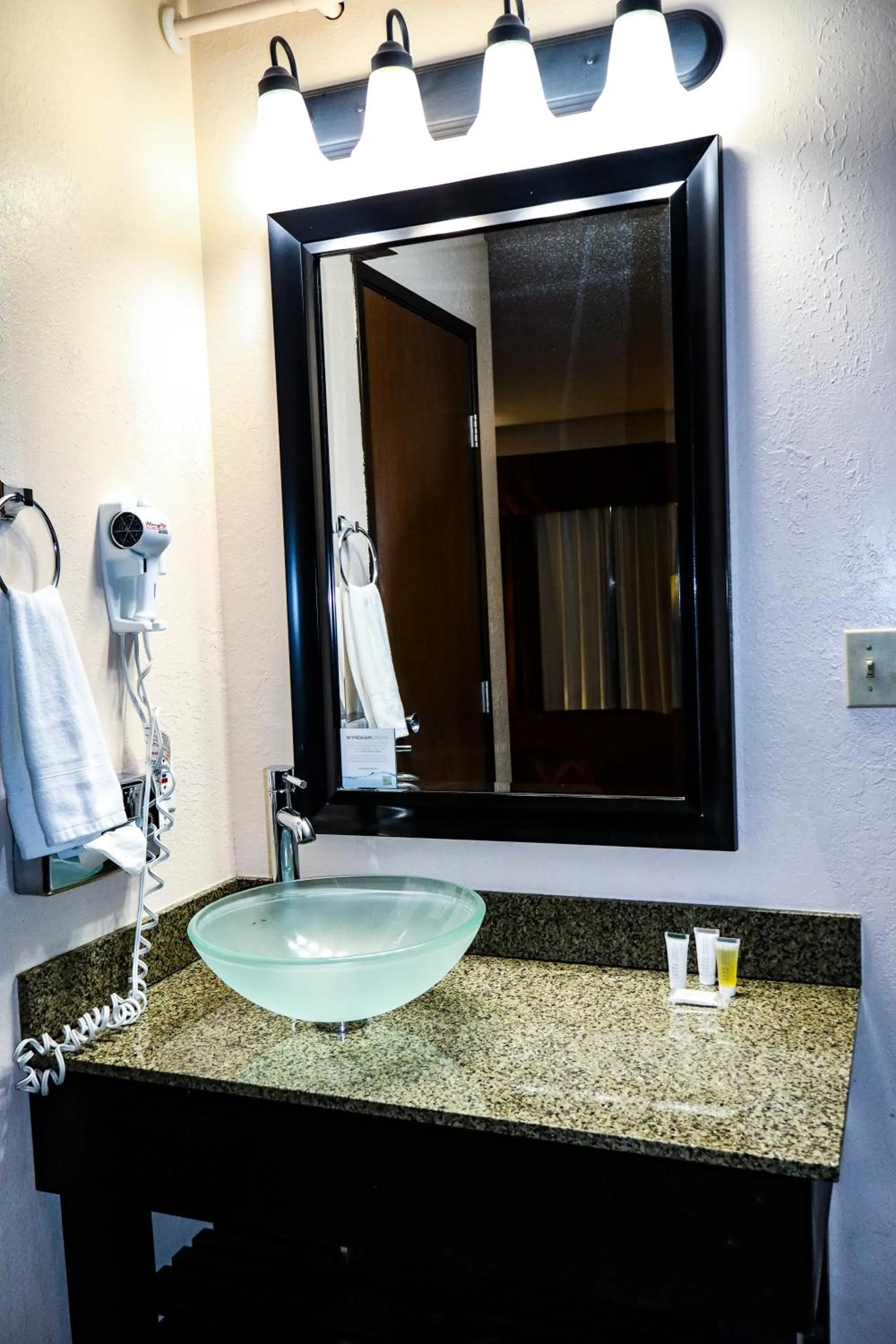 Bathroom in Super 8 by Wyndham Rapid City