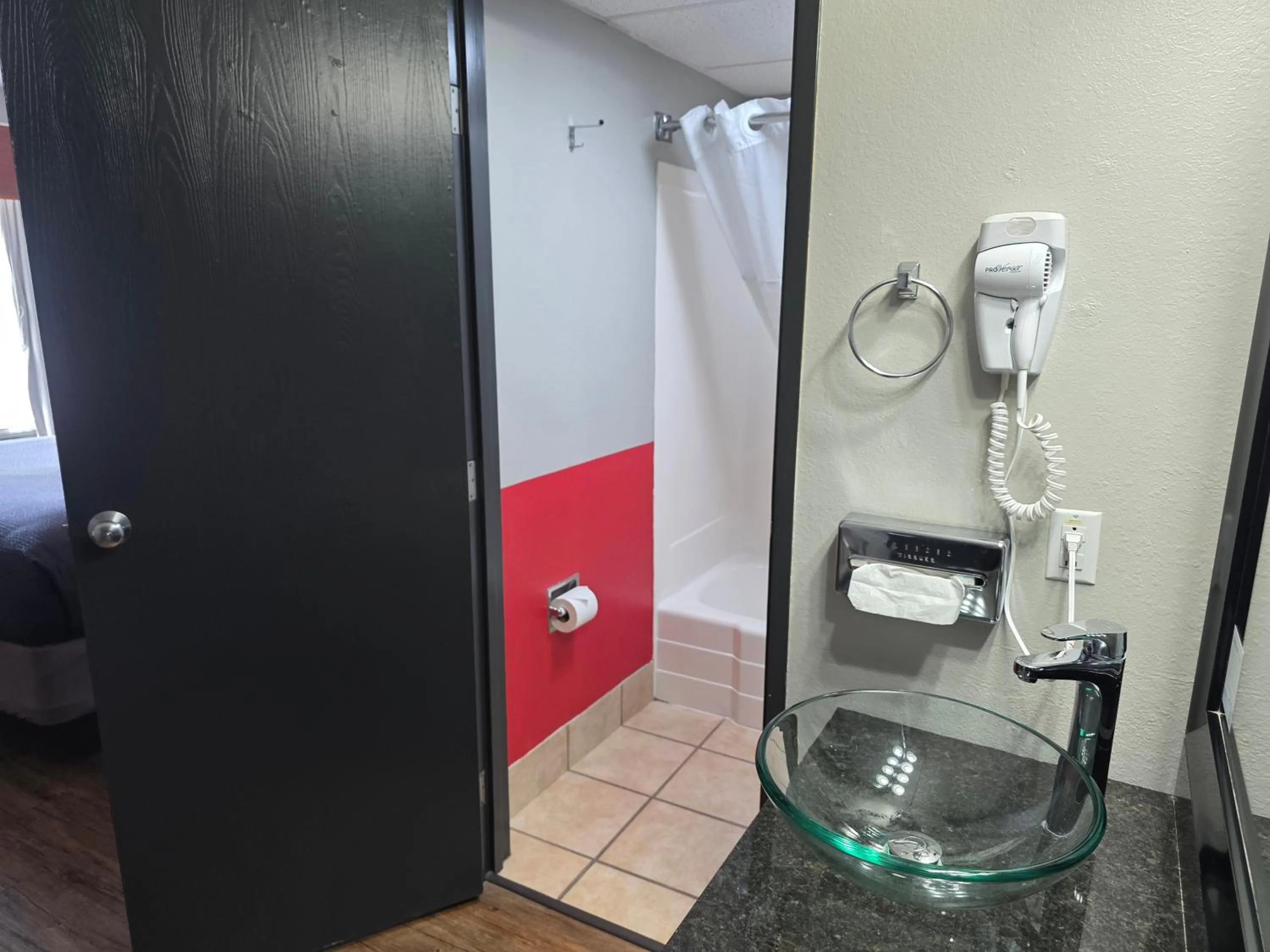 Bathroom in Super 8 by Wyndham Rapid City