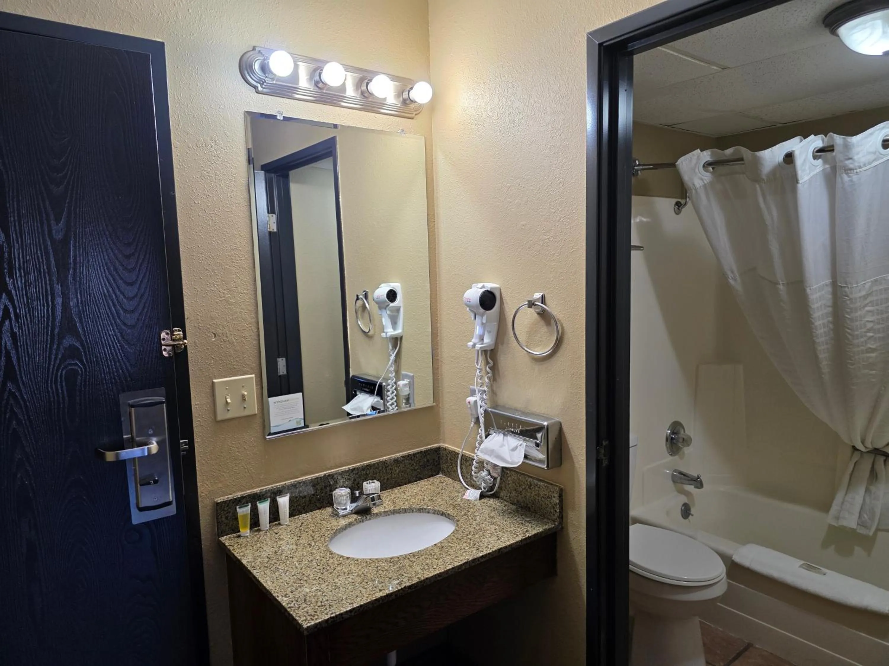 Bathroom in Super 8 by Wyndham Rapid City