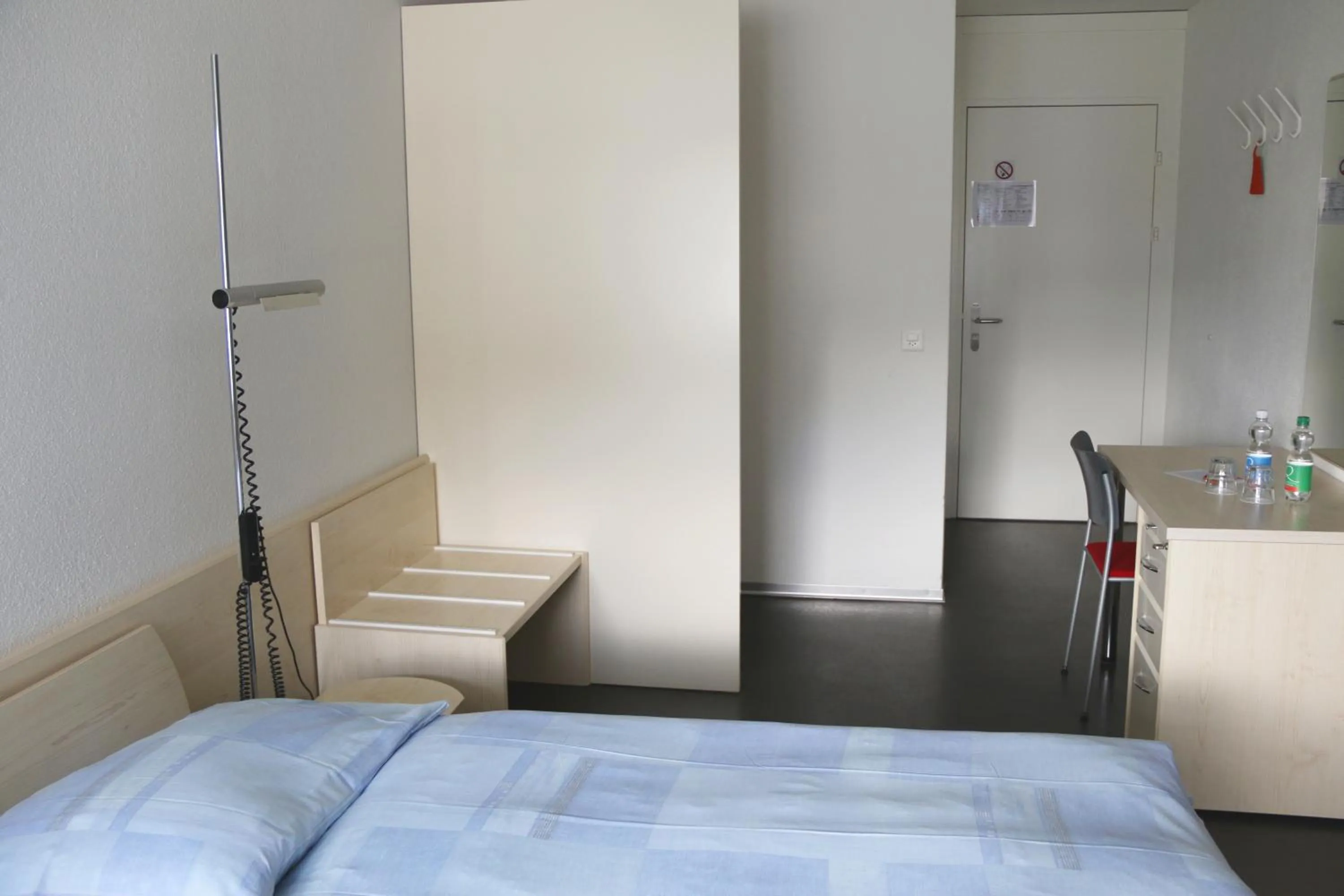 Bed in Richemont Hotel