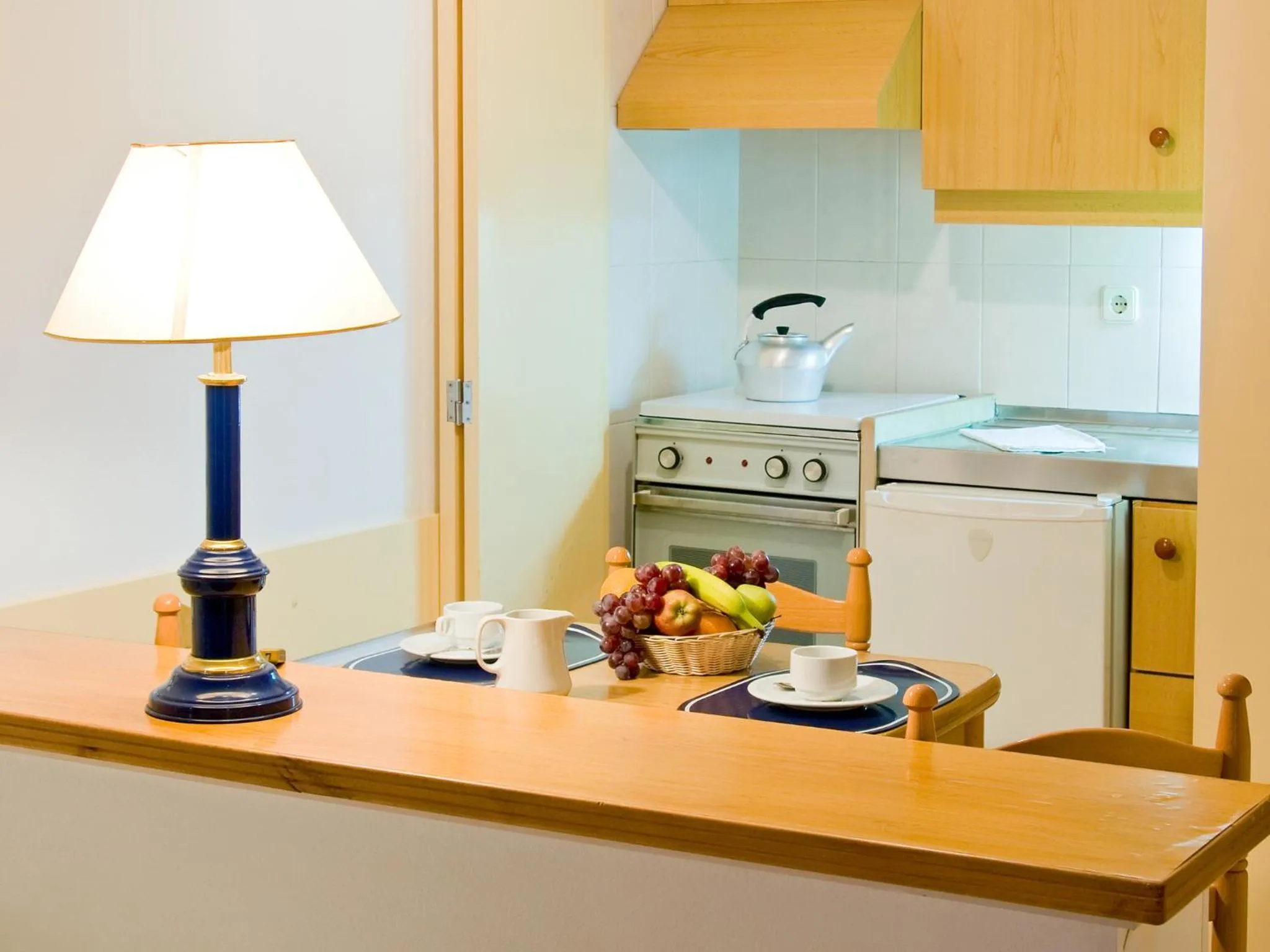 Kitchen or kitchenette in Apartamentos Edificio Albufeira - Alojamento Local