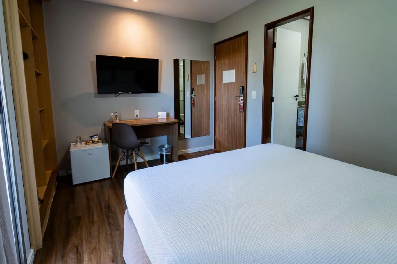 Communal lounge/ TV room, Bed in Nobile Suites Diamond