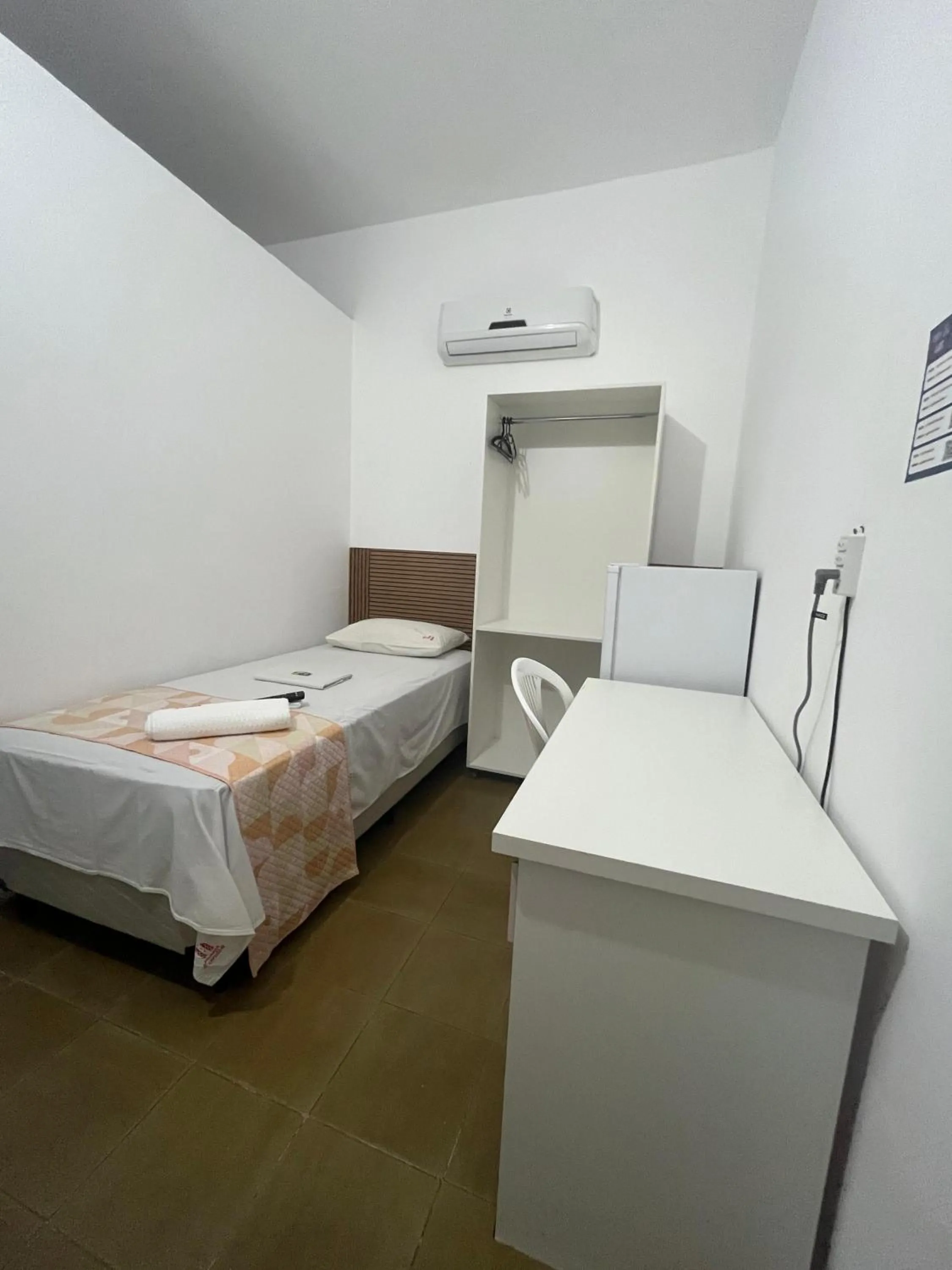 Bed in Pousada Executiva