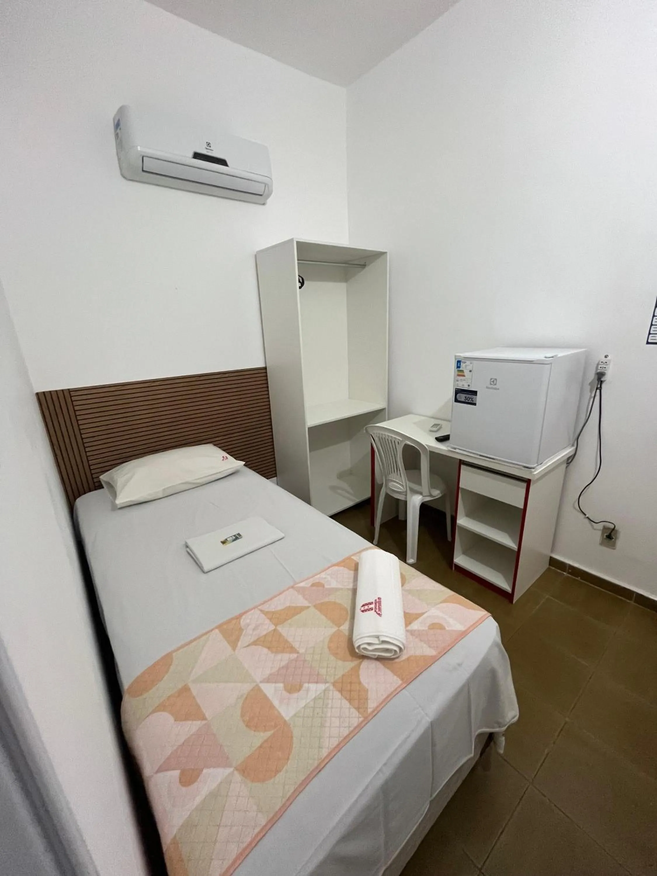 Bed in Pousada Executiva