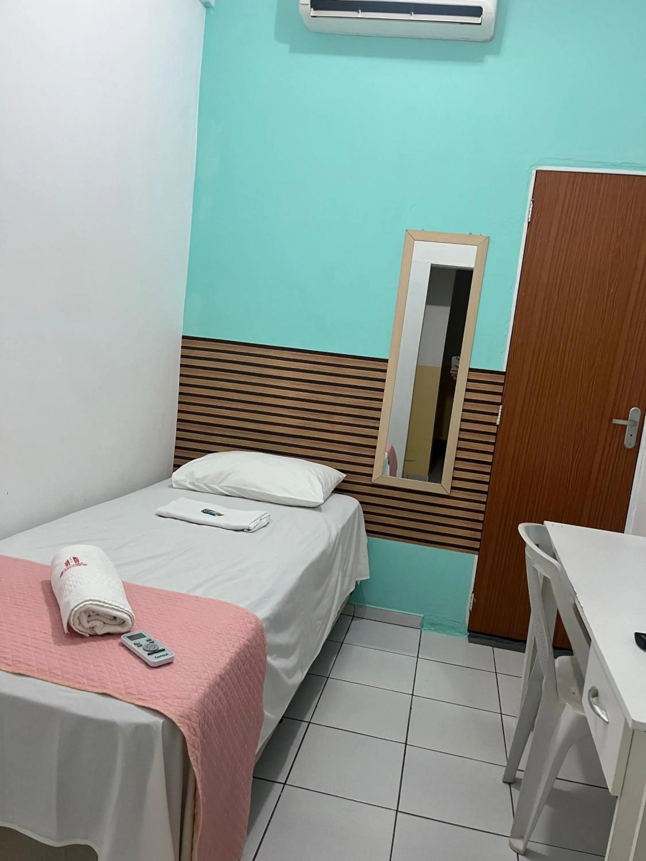 Bed in Pousada Executiva