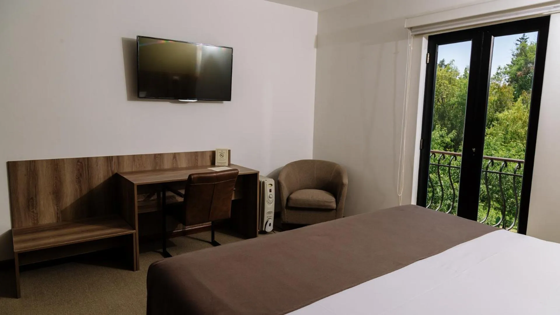 Photo of the whole room, Bed in Hotel Villa del Carmen