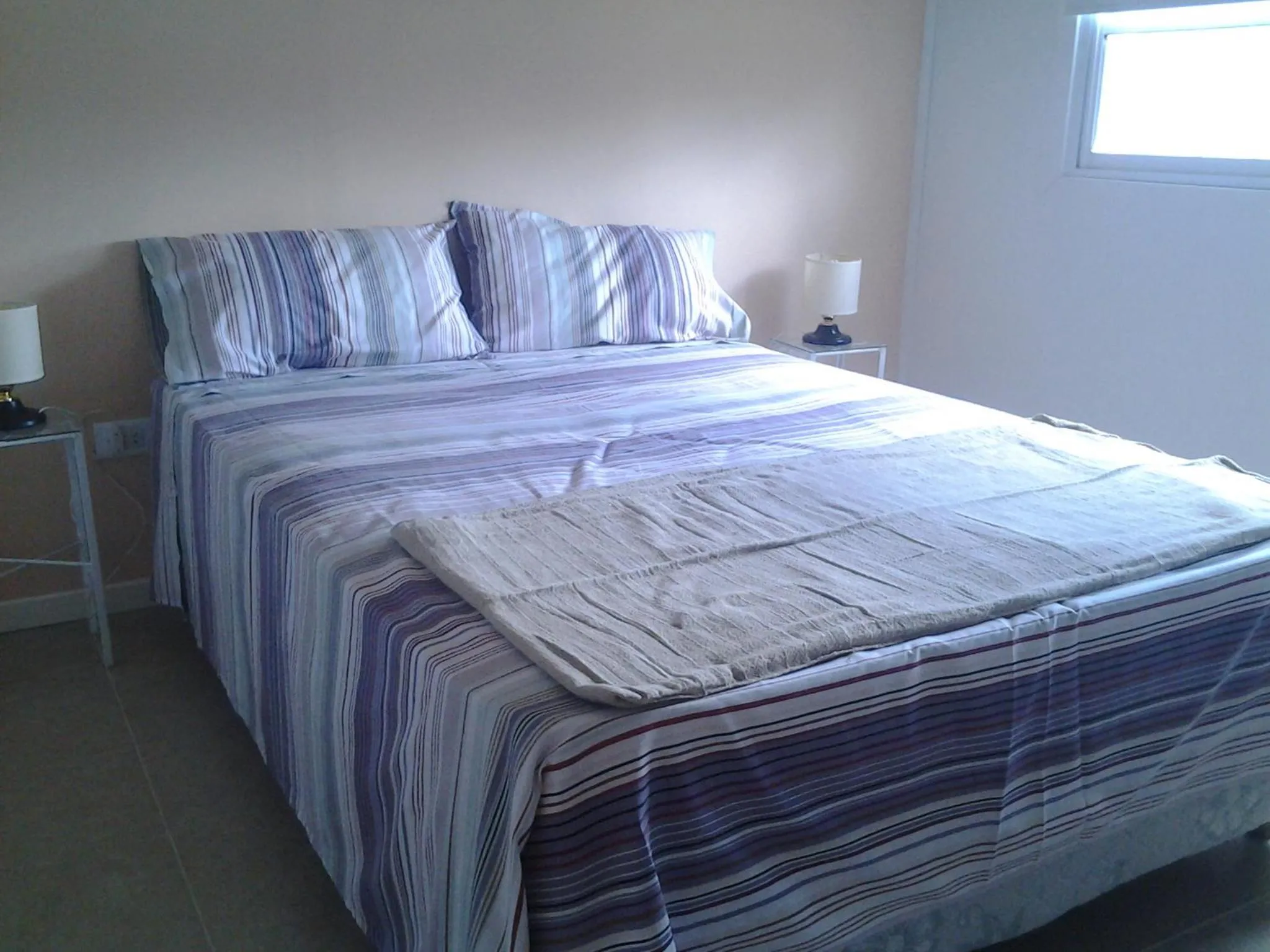 Bed in Aitue Bungalows