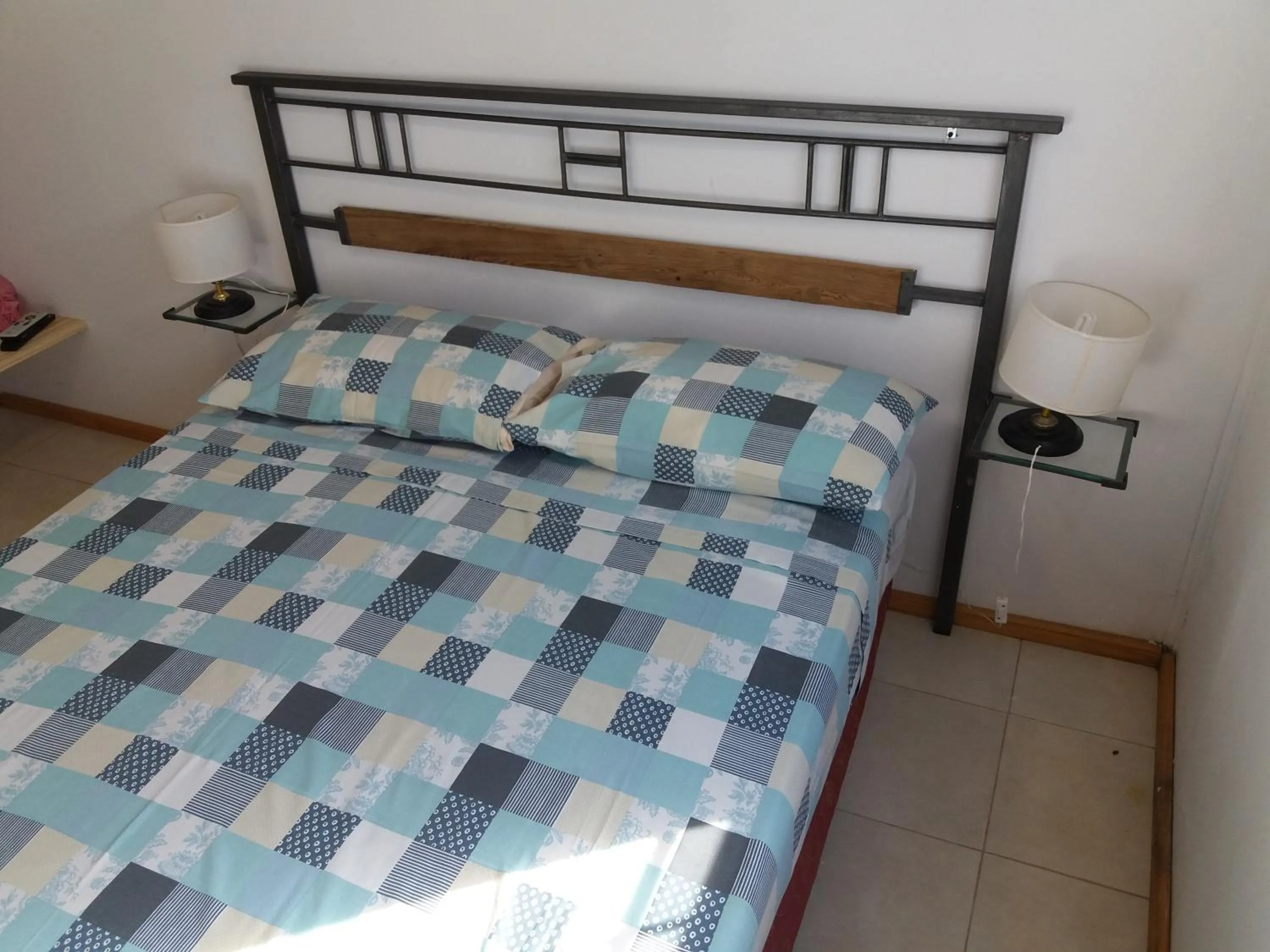 Bed in Aitue Bungalows