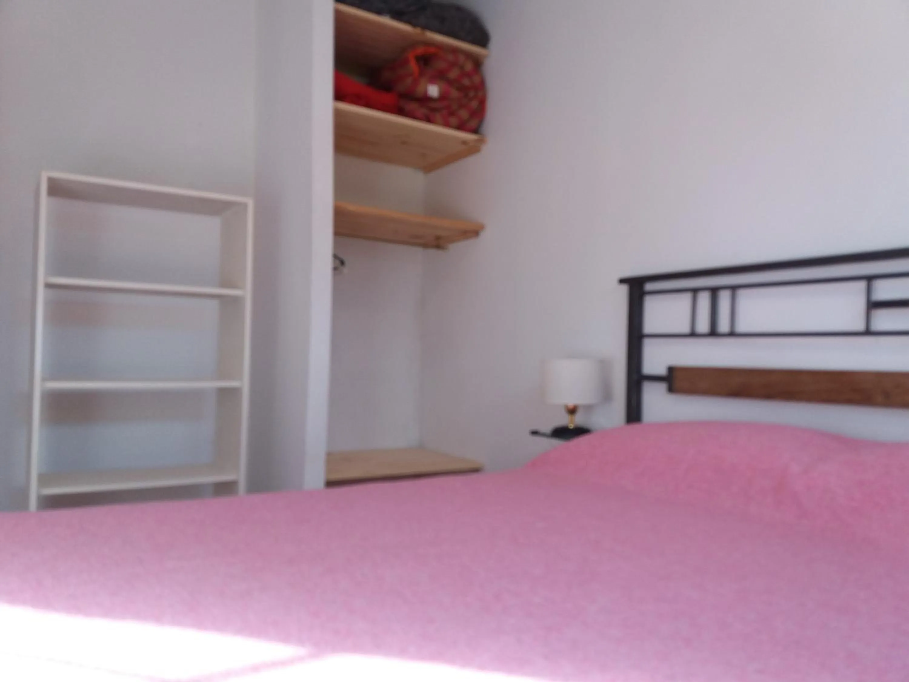 Bed in Aitue Bungalows