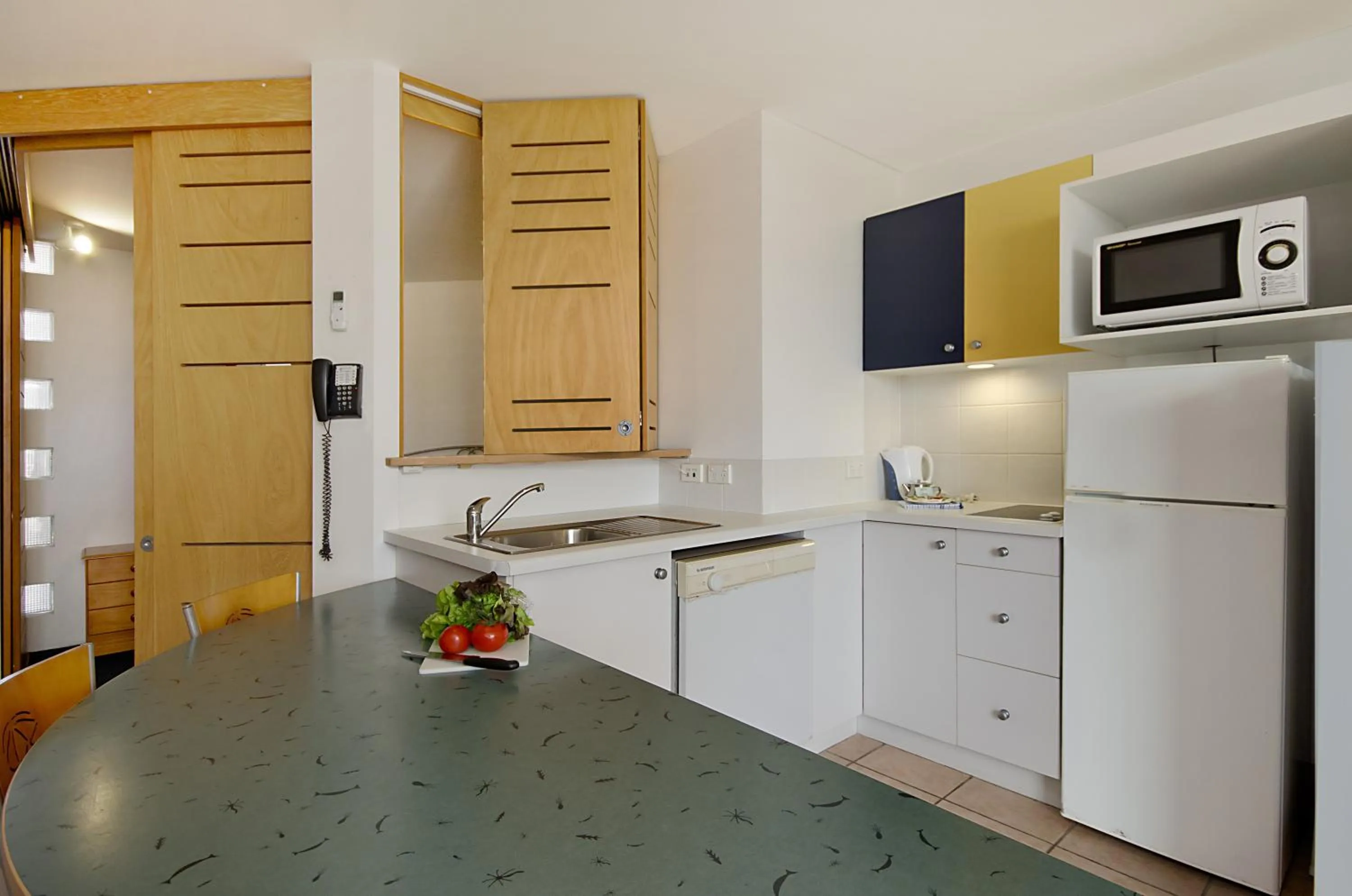 Kitchen or kitchenette in Beach Club Resort Mooloolaba