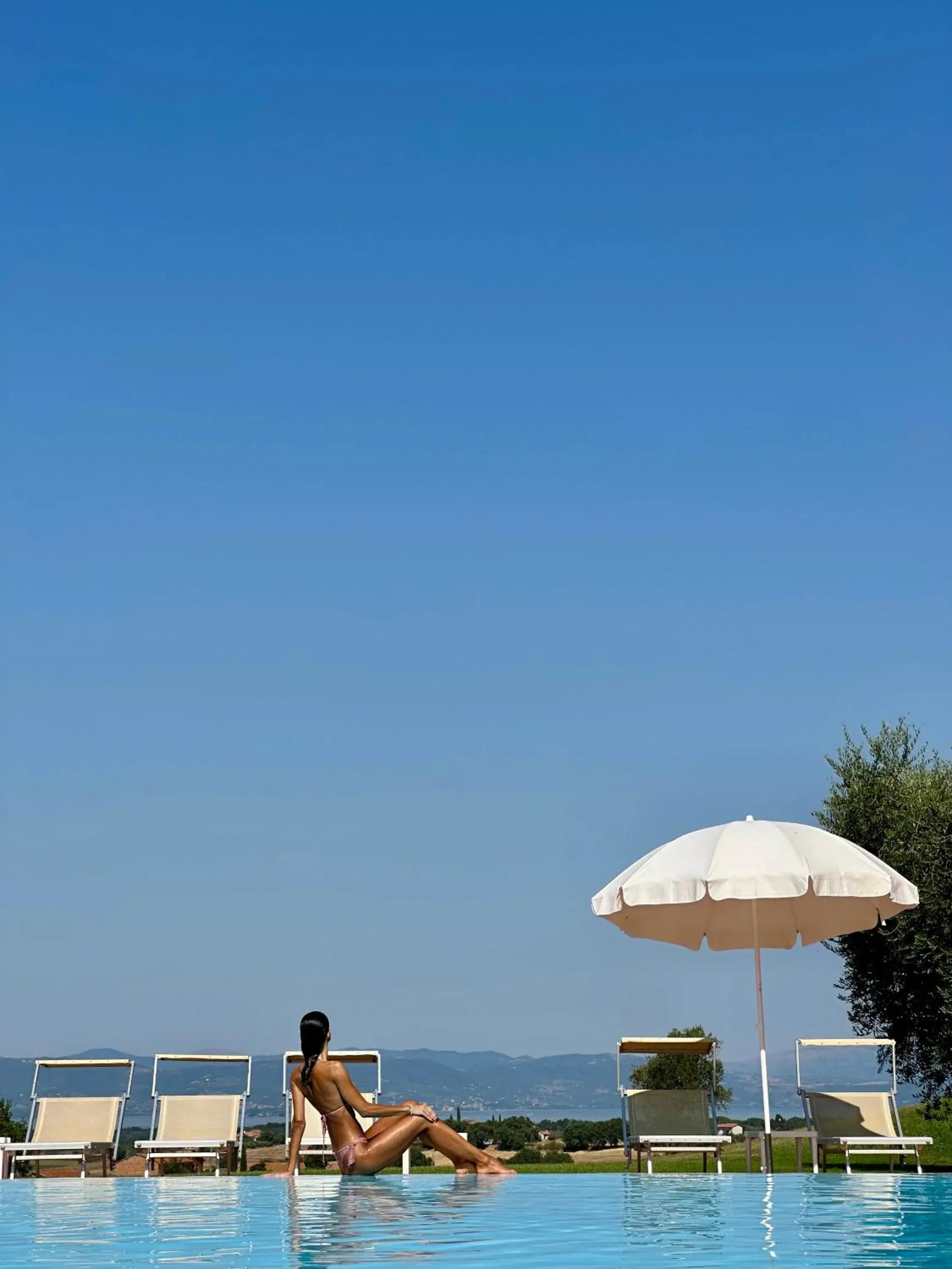 Swimming pool in Locanda Poggioleone Swimming pool in Locanda Poggioleone