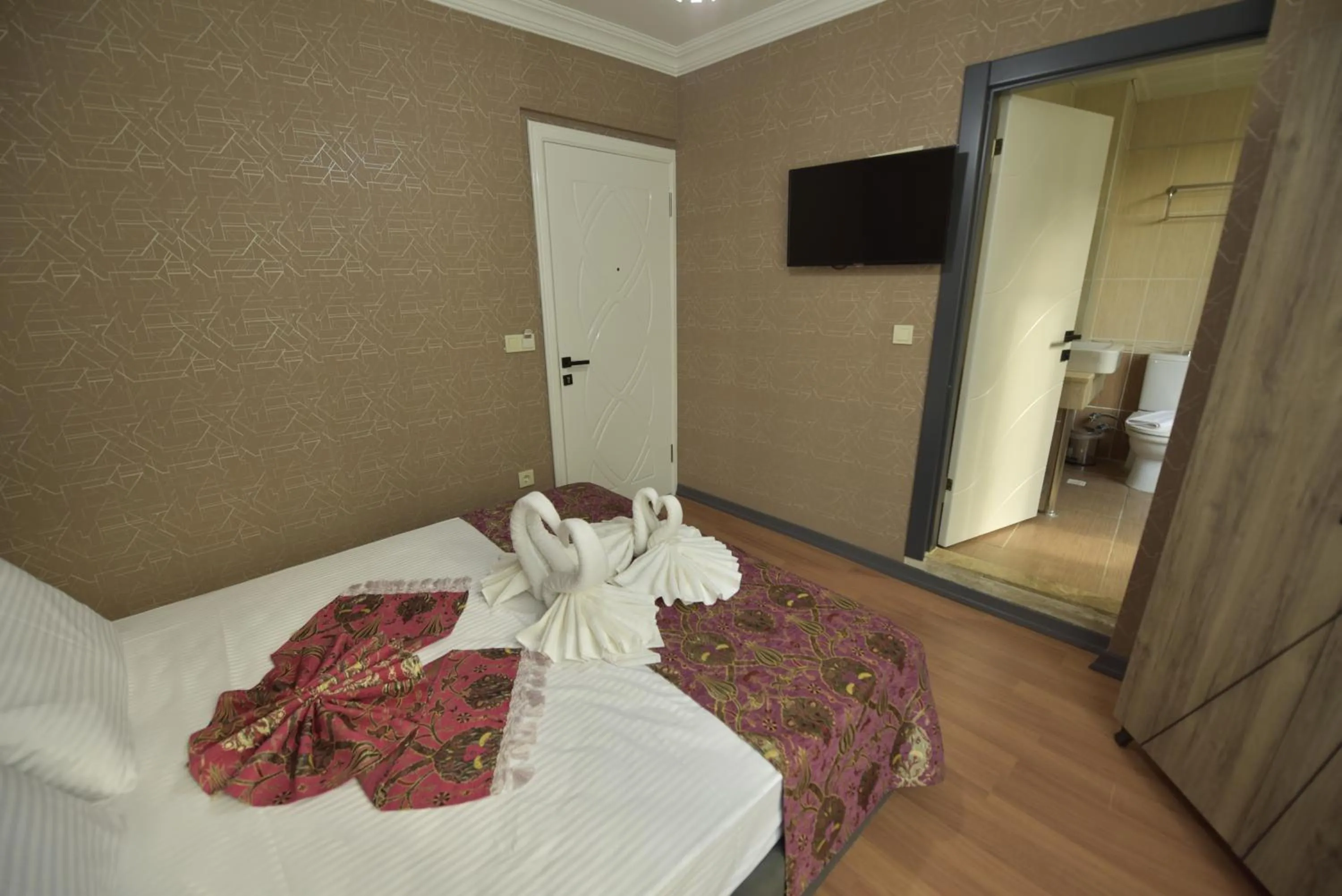 People, Bed in Omega Luxx Hotel