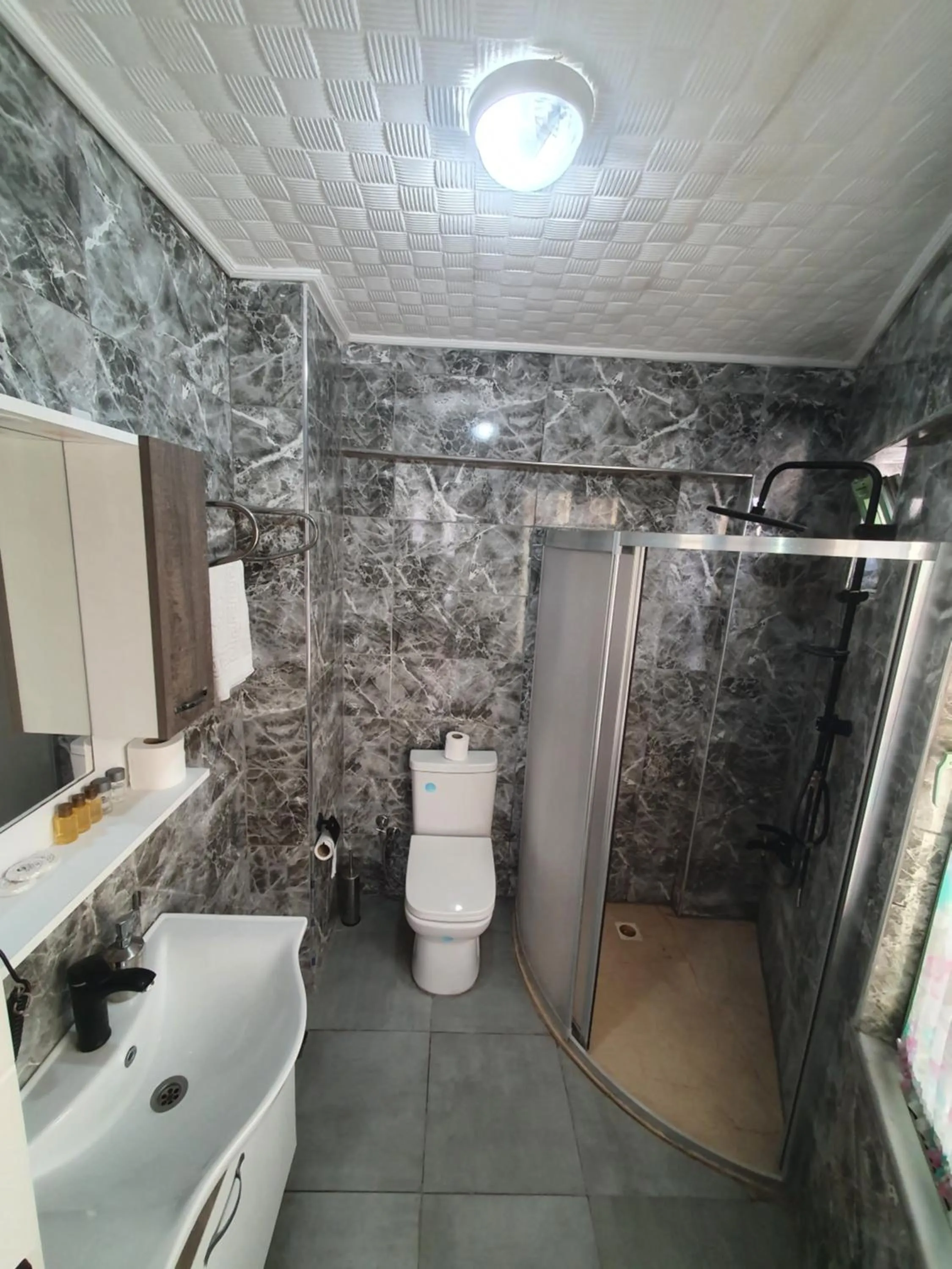 Bathroom in Omega Luxx Hotel