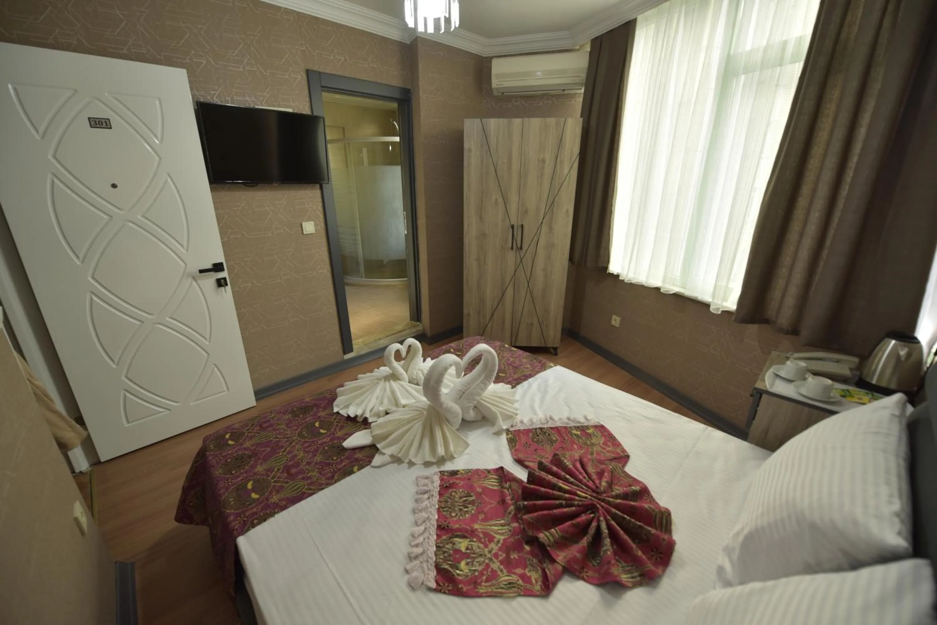 Bathroom, Bed in Omega Luxx Hotel