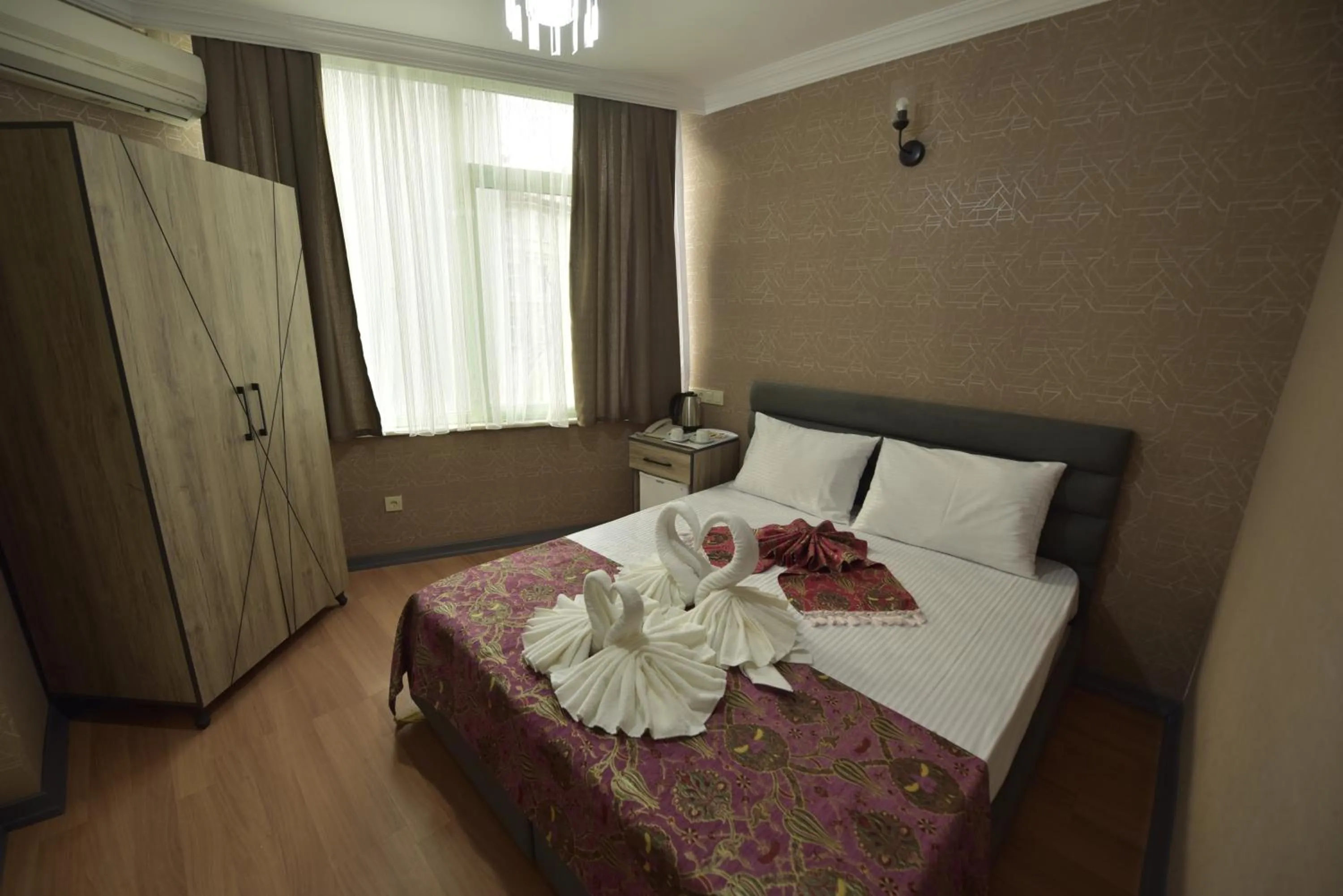 People, Bed in Omega Luxx Hotel