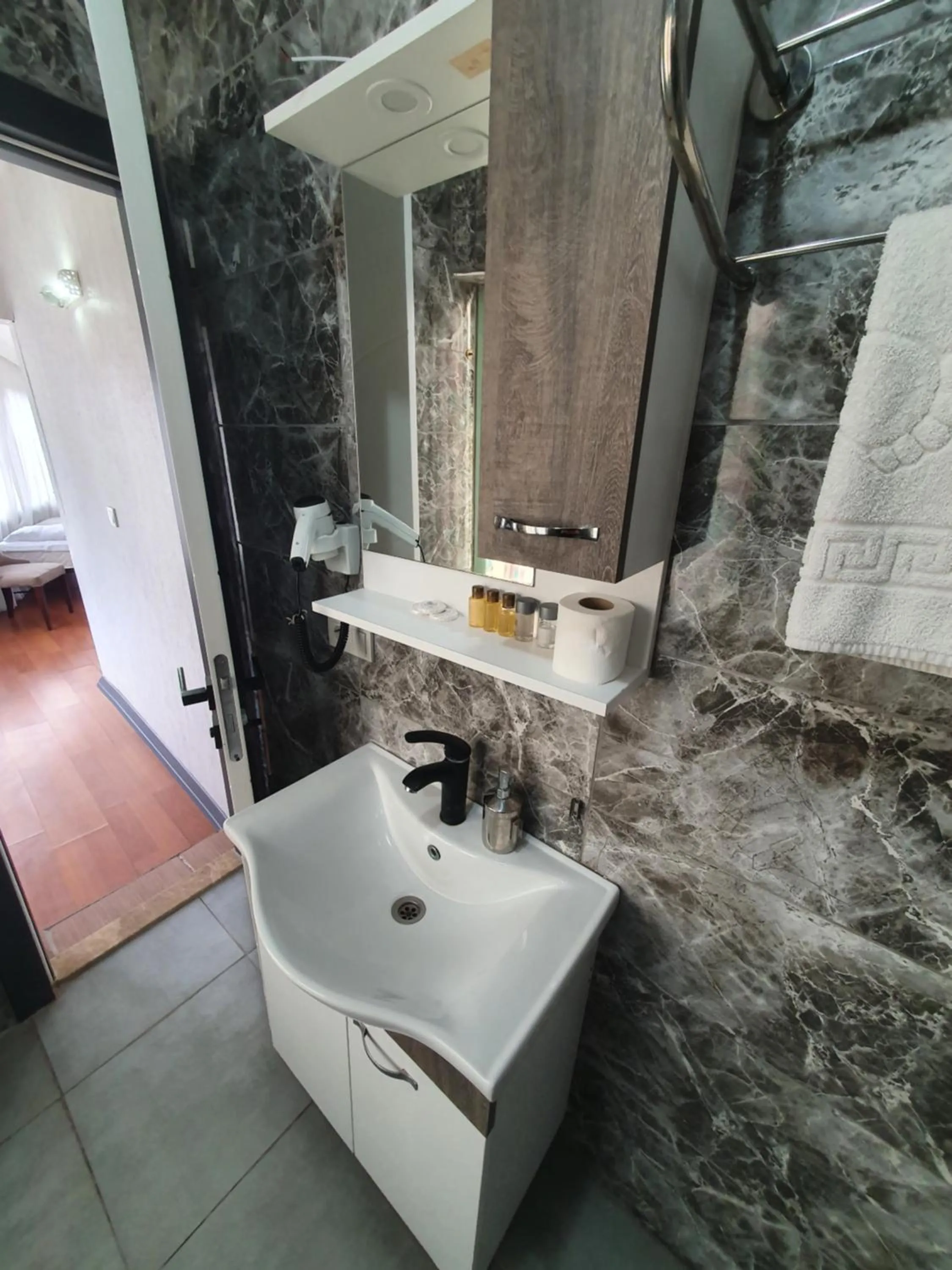 Bathroom in Omega Luxx Hotel