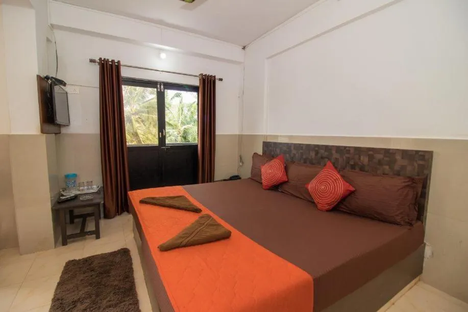 Bed in Travo Suites Panjim