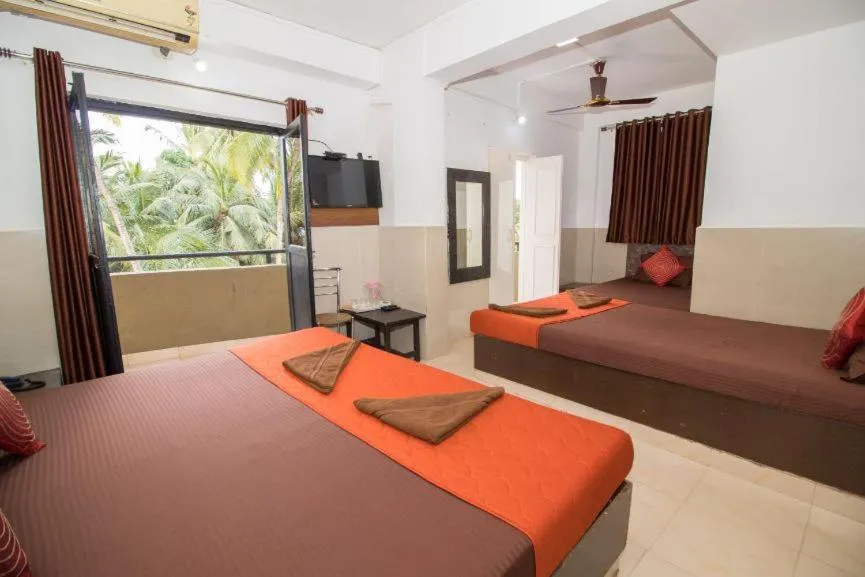 Bed in Travo Suites Panjim