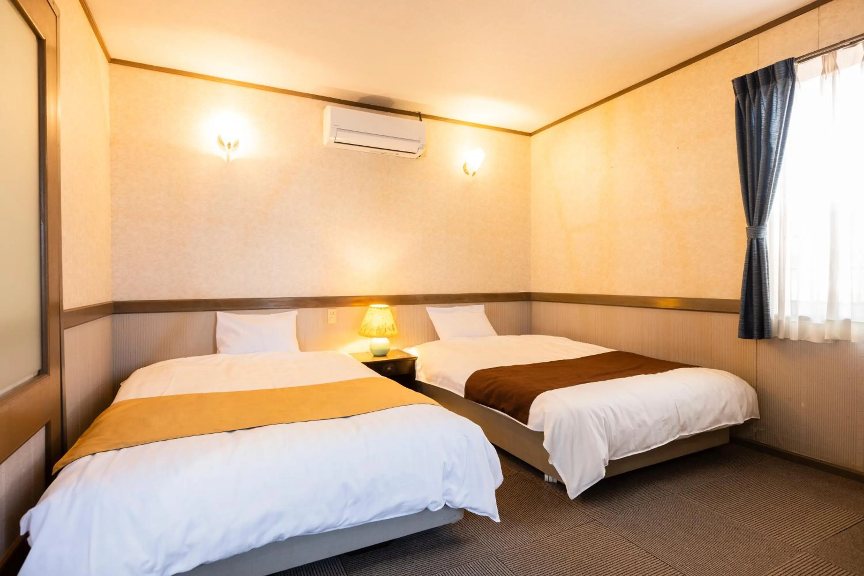 Photo of the whole room, Bed in Goto Conkana Kingdom Winery & Resort